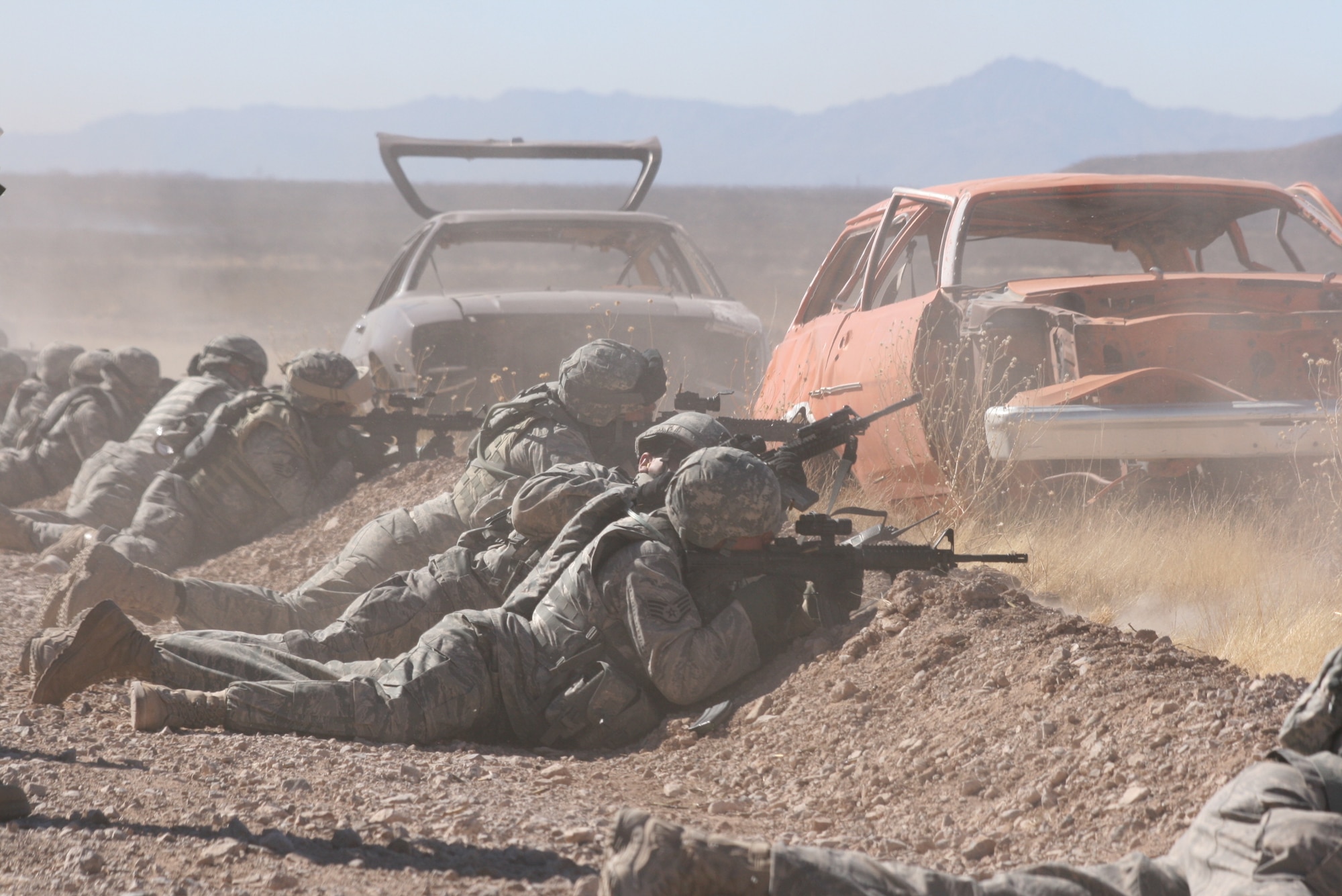 Airmen from the 376th Expeditionary Security Forces Squadron fire at multiple targets in the prone firing position during a convoy live fire exercise at McGregor Range, N.M.  Photo by Maj. Deanna Bague, Fort Bliss Public Affairs Office