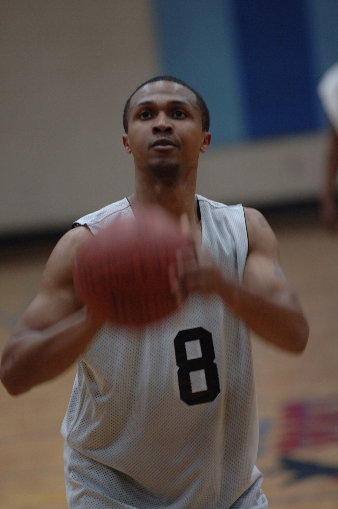 Gregory Bouie concentrates before taking his free-throw shot during the second half of the season-opener intramural basketball game Feb. 3 at the Fitness and Sports Center. LRS 1 dominated SFS 47-21. Bouie is with the 437th Security Forces Squadron. (U.S. Air Force photo/Senior Airman Timothy Taylor)