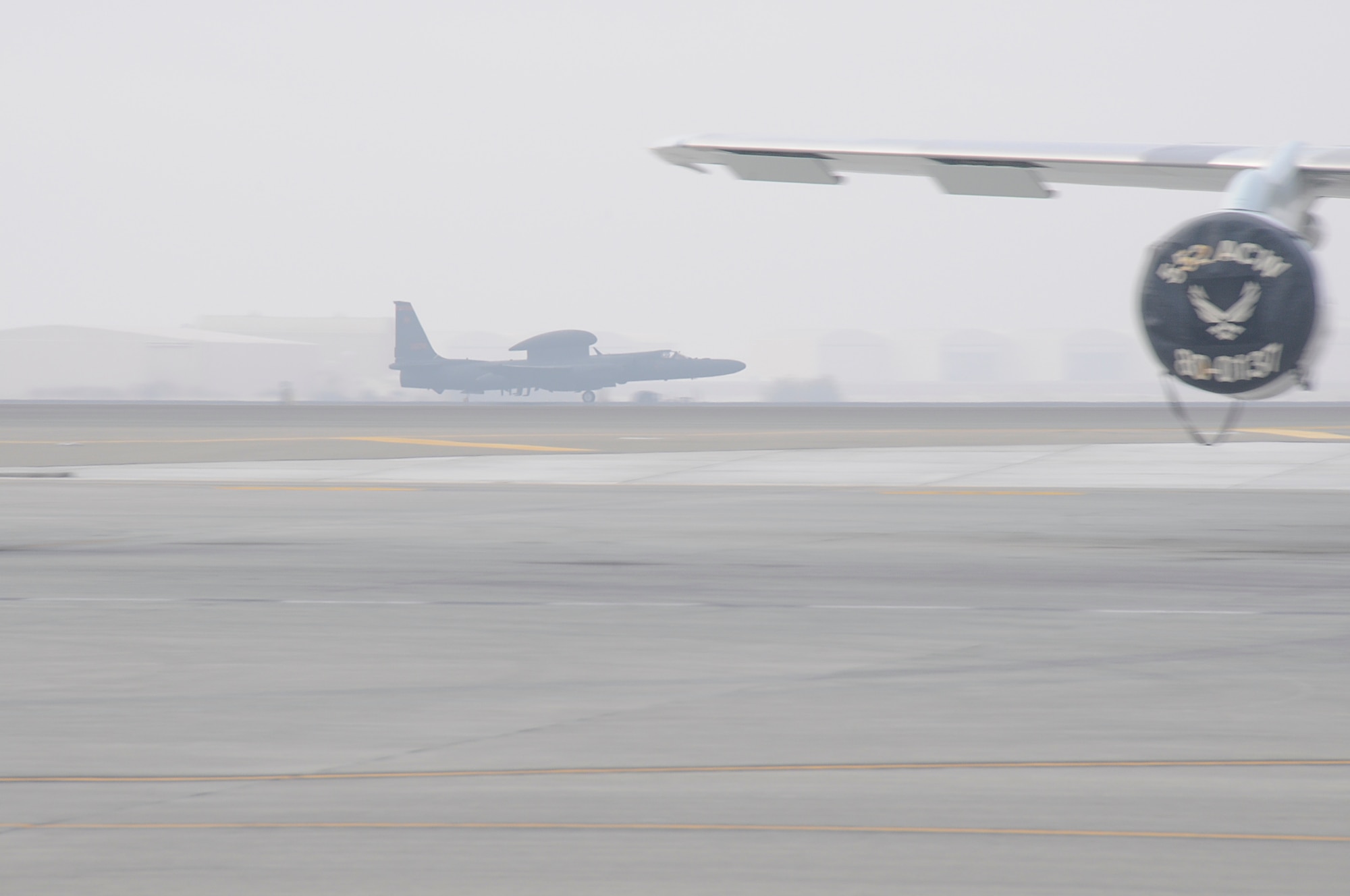 SOUTHWEST ASIA - A U-2 Dragonlady takes off at the 380th Air Expeditionary Wing on a foggy morning, Jan 28. The 380th AEW maintains all mission capabilities through any weather conditions and always stands mission ready. The U-2 Dragonlady is deployed to the 380th AEW from Beale AFB, Calif. (U.S. Air Force photo by Senior Airman Brian J. Ellis) (Released)