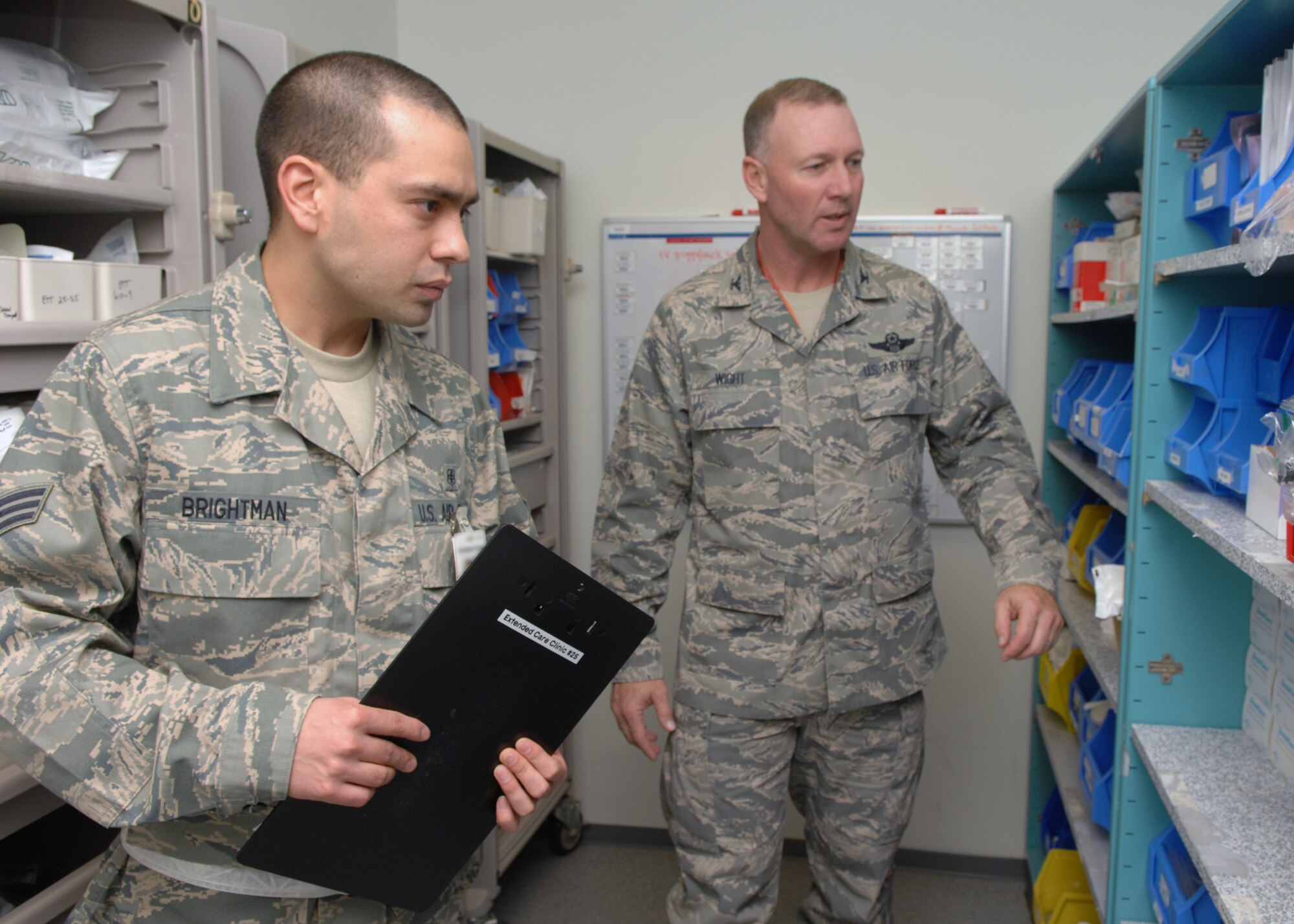 SPANGDAHLEM AIR BASE, Germany-- Senior Airman Bryon Brightman, 52nd Medical Operations Squadron, shows Col. Lee T. Wight, 52nd Fighter Wing commander, the medical supply close, Jan. 20, as part of the Commander’s Shadow program. This program is an ongoing tool used to recognize outstanding Sabers. (U.S. Air Force photo by Airman Staci Miller)