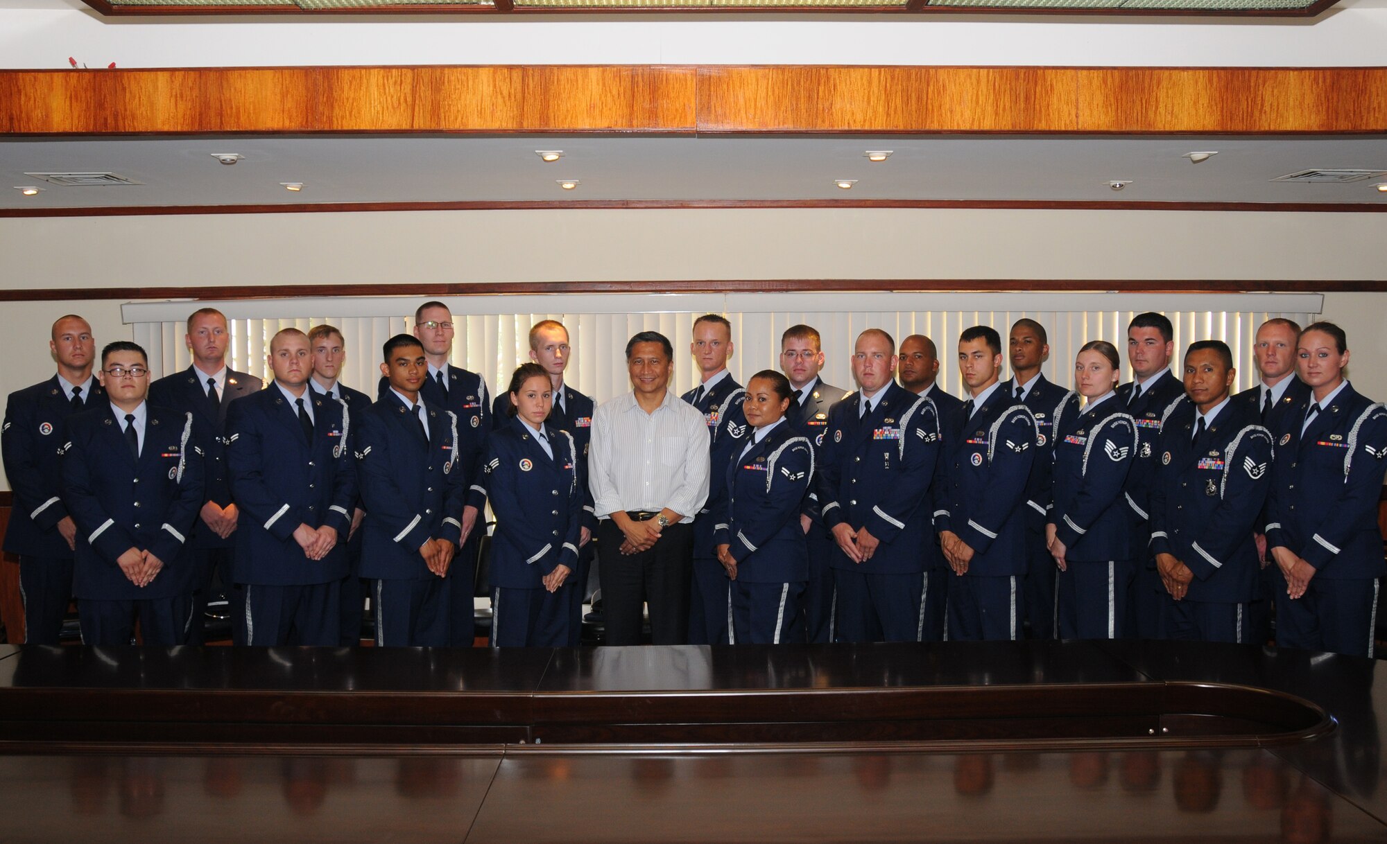 ANDERSEN AIR FORCE BASE, Guam -  Members of Andersen's Blue Knights Honor Guard pose with Michael W. Cruz, Lieutenant Governor of Guam, after he signed a proclamation declaring February 5th, to be Andersen AFB Honor Guard Day on Feb. 5 at the office of the governor.  The Blue Knights are professionals  trained in every aspect of ceremonies and customs and courtesies as elite professionals worthy of representing the Air Force.  (U.S. Air Force photo by Staff Sgt Jamie Lessard)   