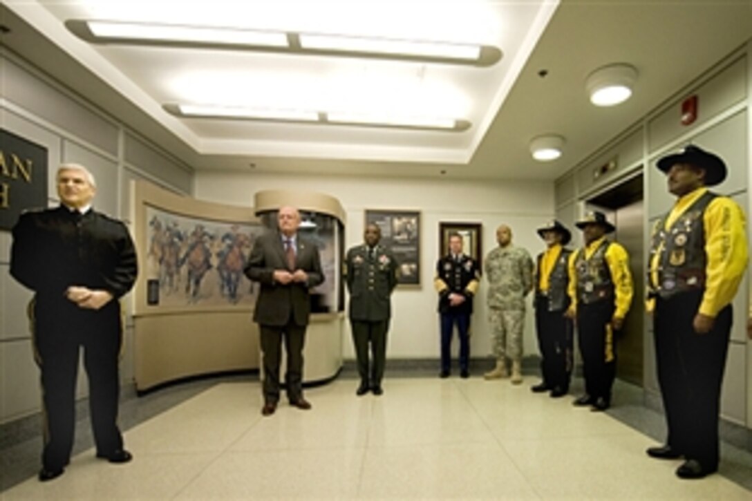 U.S. Army Gen. George W. Casey Jr., the Army's chief of staff; retired U.S. Army Gen. Gordon Sullivan, 32nd Army chief of staff; Sgt. Maj. Jeff Wells; Sgt. Maj. of the Army Kenneth Preston, U.S. Army Sgt.1st Class Craig Browne; and members of Buffalo Soldier chapters participate in a rededication ceremony of a Buffalo Soldier memorial at the Pentagon, Feb. 5, 2009.