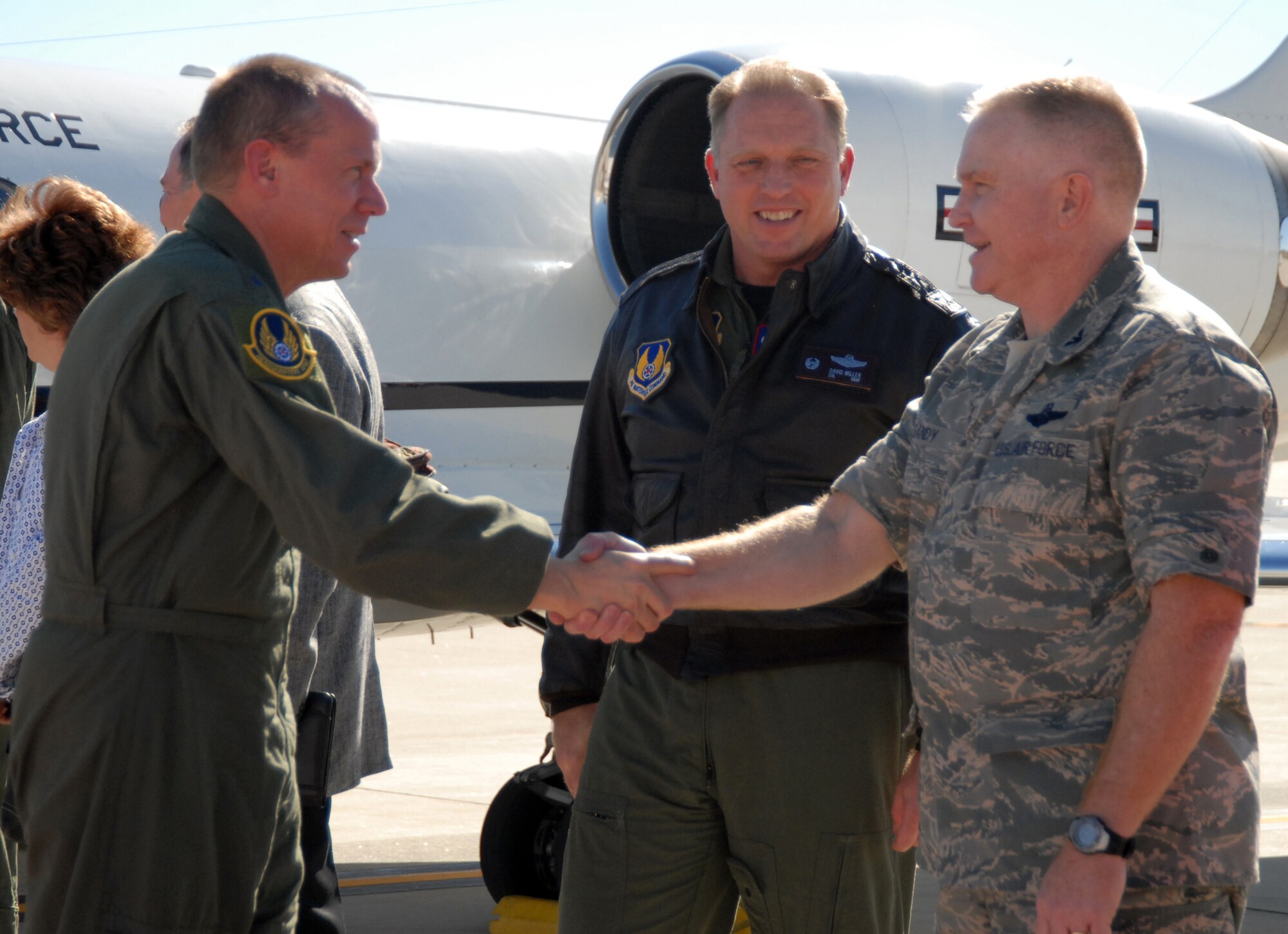 Col. Jerry Gandy, 95th Air Base Wing commander, welcomes Gen. Donald Hoffman, commander of Air Force Materiel Command, to Edwards Feb. 3 as Col. David Miller, Air Force Flight Test Center vice commander, looks on. This was General Hoffman's first visit here as the AFMC commander. (Air Force photo by Senior Airman Julius Delos Reyes)