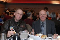 MINOT AIR FORCE BASE, N.D. -- Col. Joel S. Westa, 5th Bomb Wing commander here, enjoys lunch with Bruce Carlson, chair of the Military Affairs Committee in Minot. The Military Affairs Committee cultivates relations between members of the community and base personnel, and promotes the communication and understanding of the subjects that affect both parties. (U.S. Air Force photo by Senior Airman Kelly Timney)