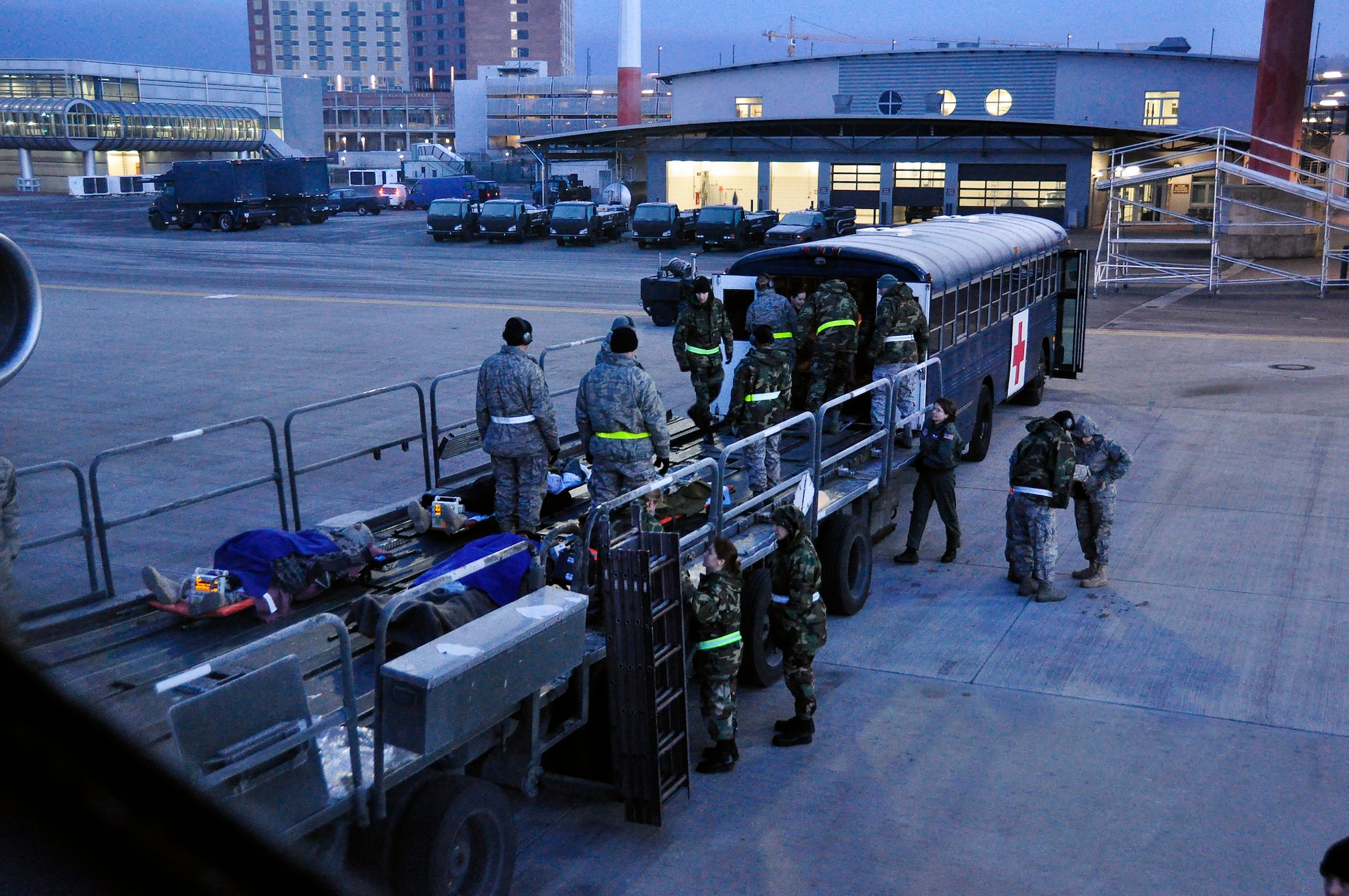 Medical Airmen unload servicemembers evacuated from Afghanistan at Ramstein Air Base, Germany. A KC-135 Stratotanker flown by Reservists from the 931st Air Refueling Group airlifted the sick and wounded troops during a 12-day aeromedical evacuation mission. (U.S. Air Force photo/Lt. Col. Tyoshi Tung) 
