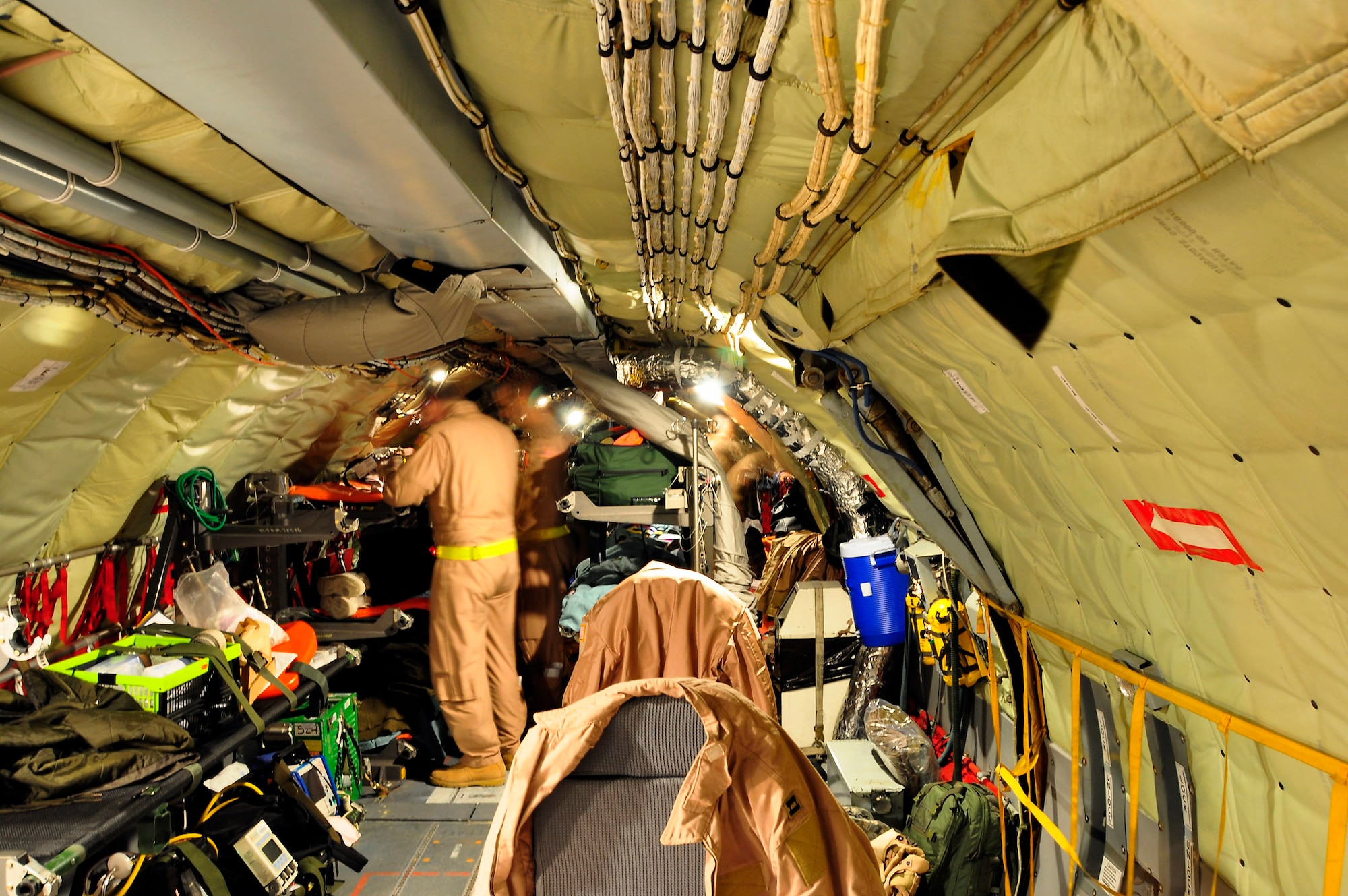 The interiors of KC-135 Stratotankers used for aeromedical evacuation missions become packed "wall-to-wall" with equipment. Crews from the 931st Air Refueling Group have successfully completed three missions involving the evacuation of sick and wounded troops from Afghanistan. The 931st ARG is an Air Force Reserve unit at McConnell Air Force Base, Kan. (U.S. Air Force photo/Lt. Col. Tyoshi Tung)
