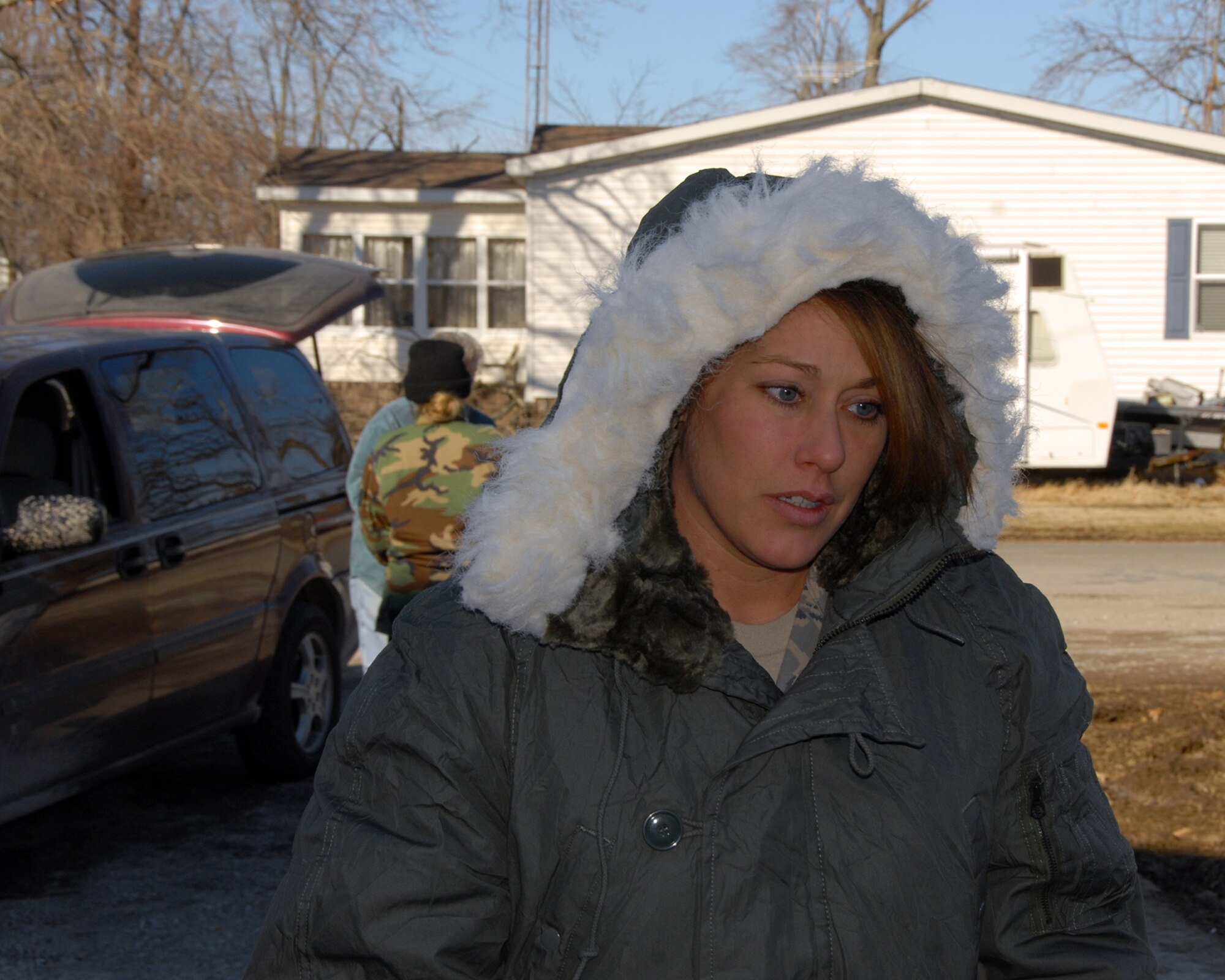 Kentucky Air National Guard member, A1C Windy Wagner,  123rd Security Forces Sq.  retrieves supplies for needy residents in Bandana, Kentucky during ice storm relief efforts.