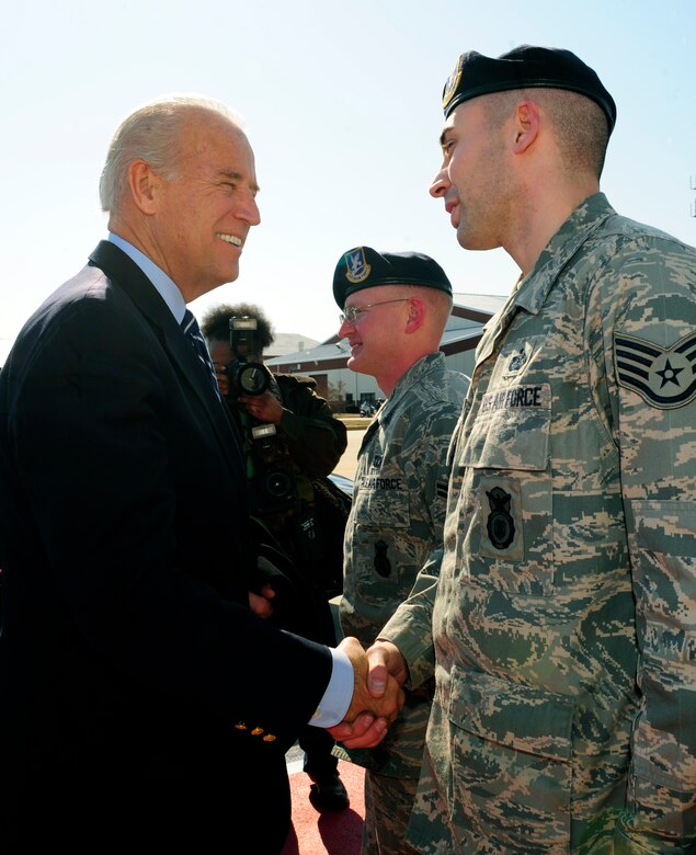 LANGLEY AIR FORCE BASE, Va. -- Vice President Joe Biden shakes hands with Staff Sgt. Jeremy Gamache, 1st Security Forces Squadron, after arriving here Feb. 6. The vice president stopped at Langley on his way to a conference in Williamsburg, Va. (U.S. Air Force photo / Senior Airman Vernon Young)
