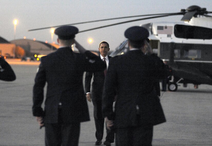President Barack Obama is accompanied by Col. Steven Shepro, 316th Wing commander, prior to his first official trip as President of the United States on Air Force One on Feb. 5. President Obama traveled to Williamsburg, Va. to speak, urging House Democrats tonight to set aside their differences with the Senate and Republicans in order to push forward quickly with the stimulus package. (US Air Force/Bobby Jones)