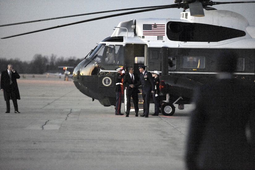 President Barack Obama is greeted by Col. Steven Shepro, 316th Wing commander, prior to his first official trip as President of the United States on Air Force One on Feb. 5. President Obama traveled to Williamsburg, Va. to speak, urging House Democrats tonight to set aside their differences with the Senate and Republicans in order to push forward quickly with the stimulus package. (US Air Force/Bobby Jones)