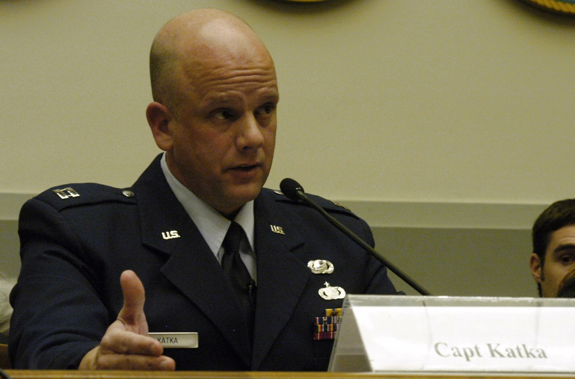 Capt. Daniel Katka responds to questions from members of the House Armed Services Committee on Capitol Hill Jan. 28. Captain Katka is a sexual assault response coordinator from Lackland Air Force Base, Texas. A panel of sister service representatives joined the captain to answer questions from the Military Personnel Subcommittee to discuss SARC programs. (U.S. Air Force photo/Staff Sgt. J.G. Buzanowski) 
