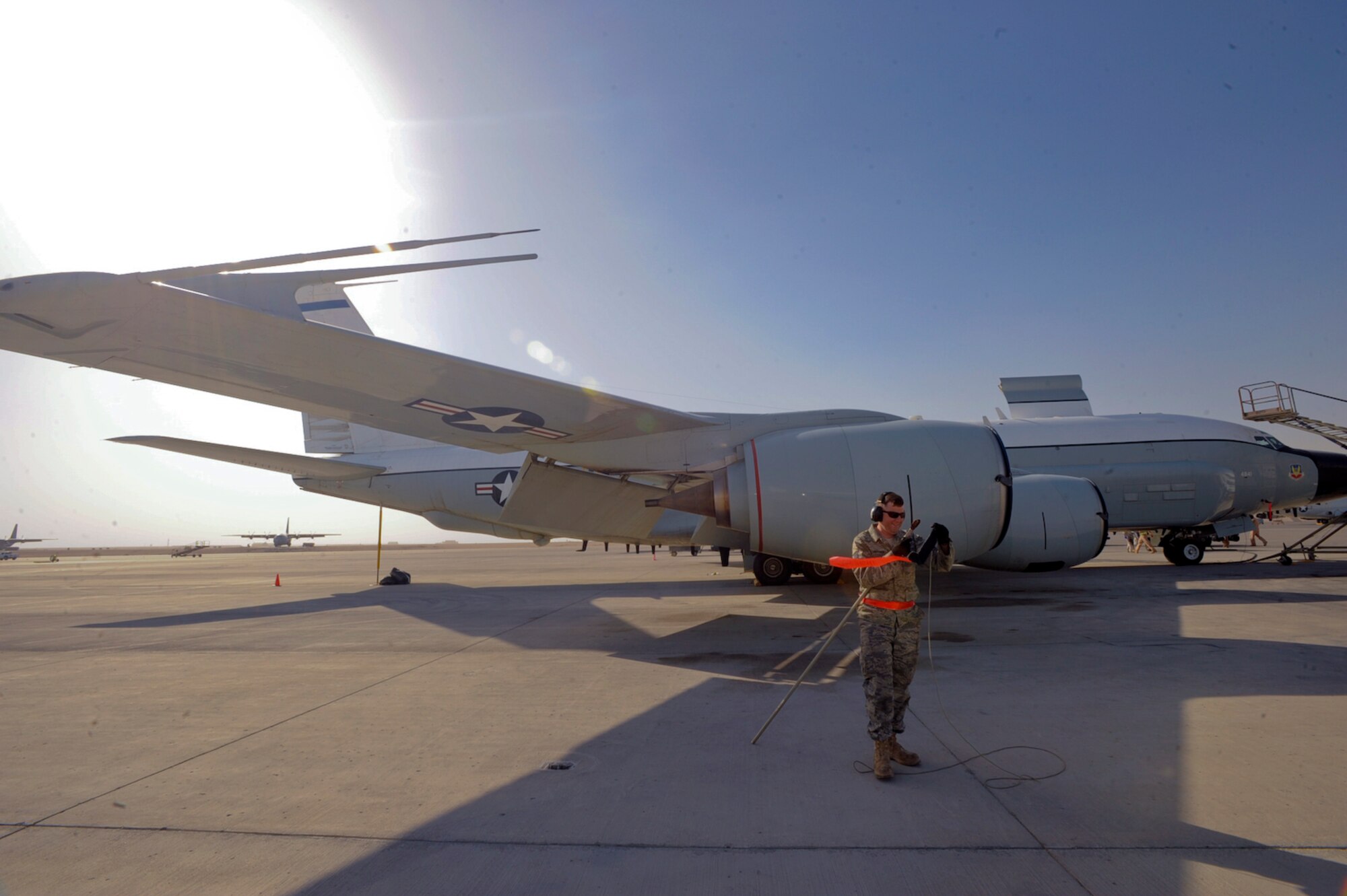 Tech. Sgt. Luke Schnittker, of the 55th Aircraft Maintenance Unit, preps a boom cover to go over one of the RC-135 Rivet Joint's antennas, Feb. 5, 2009, in an undisclosed location in Southwest Asia.  The boom cover prevents foreign objects from damaging the antenna, which is used to indicate the aircraft's altitude while in flight. Sergeant Schnittker hails from Lompoc, Calif. and is deployed from Royal Air Force Mildenhall, England in support of Operations Iraqi and Enduring Freedom and Combined Joint Task Force - Horn of Africa. (U.S. Air Force Photo by Staff Sgt. Joshua Garcia/released)