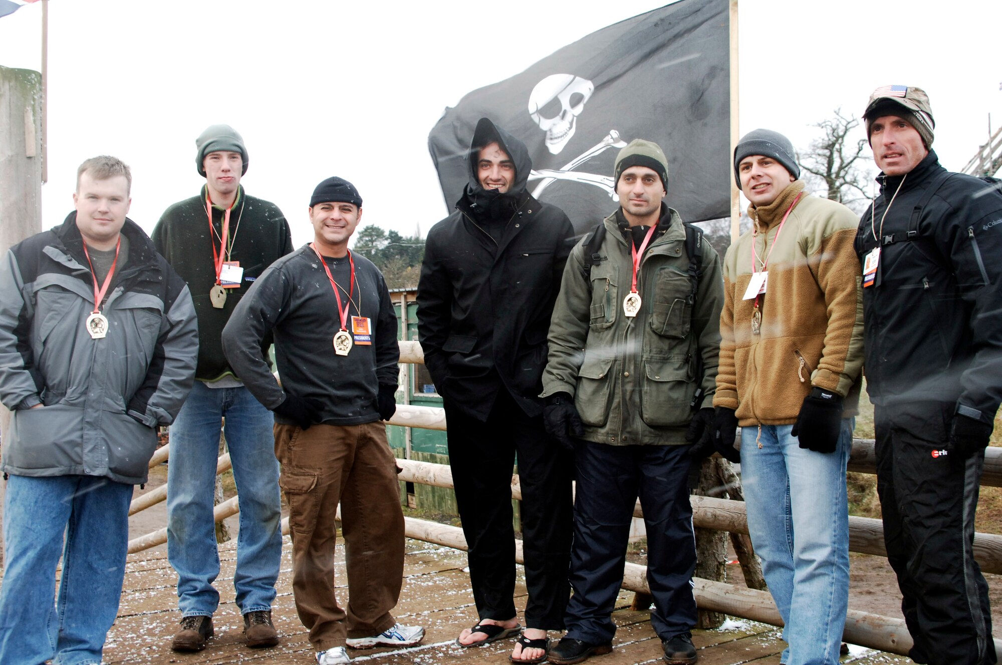 The JAC HAMMERS team with their medals signifying completion of the Tough Guy Winter 2009 challenge "The Brave and the Beautiful" on February 1, 2009 in Perton, England.  (U.S. Air Force photo by Staff Sgt. Rachel Goff)