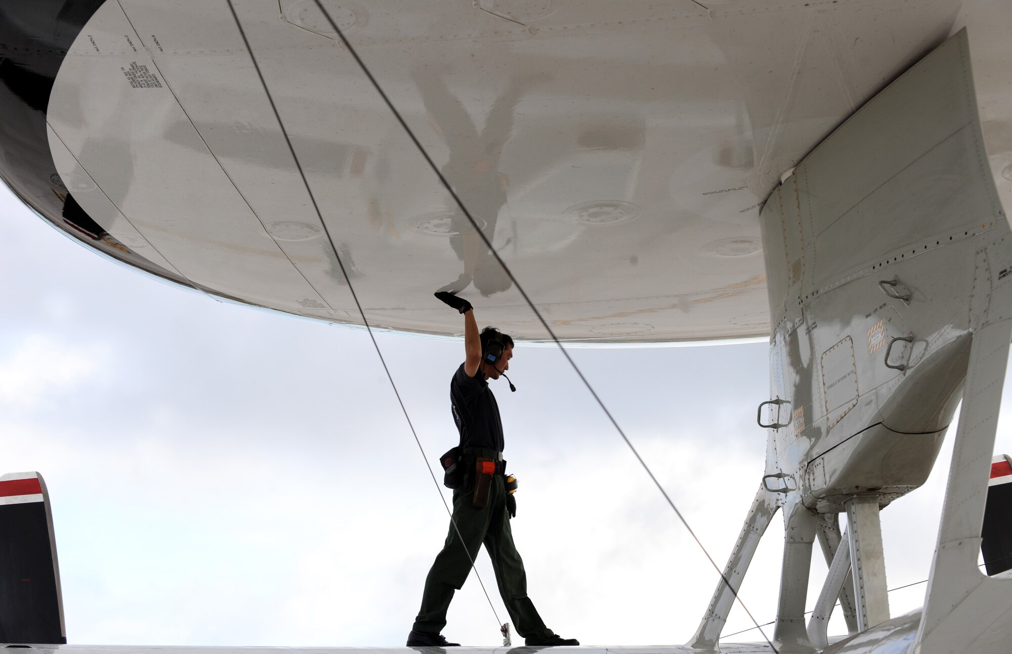 Sgt. Masatsugo Yamaguchi, aircraft maintainer, Japan Air Self Defense Force inspects an E2-C aircraft Feb. 5 at Andersen Air Force Base, Guam during Cope North 09-1 after a local area mission. Units from the U.S. Air Force, U.S. Navy and the Japan Air Self Defense Force will participate in exercise Cope North 09-1 at Andersen from 2-13 Feb. The exercise is the first iteration of a regularly scheduled joint and bilateral exercise and is part of the on-going series of exercises designed to enhance air operations in defense of Japan. 

(U.S. Air Force photo/ Master Sgt. Kevin J. Gruenwald) released





















  












 











































  












 

























