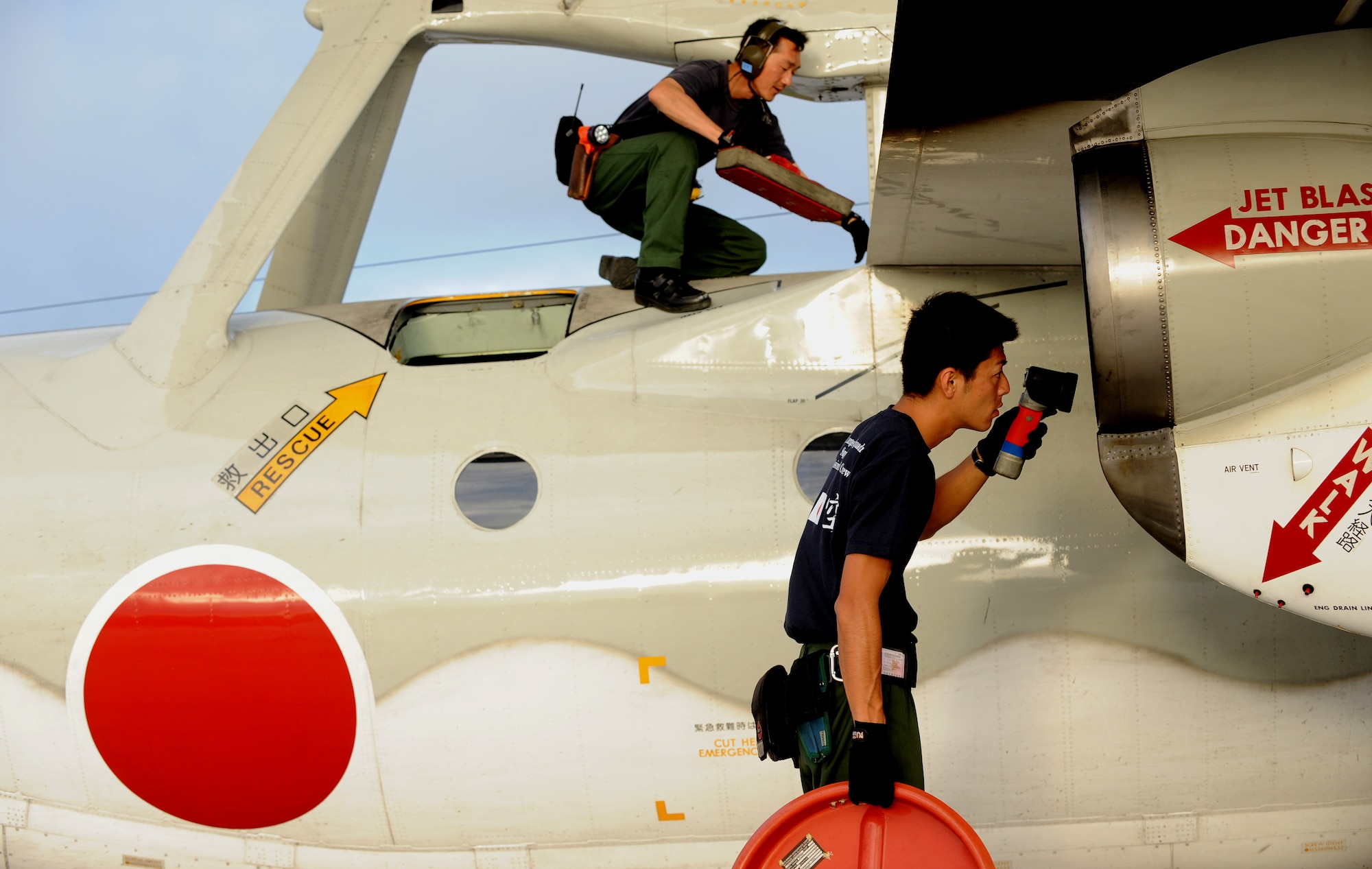 (top) Sgt. Masatsugo Yamaguchi and Sgt. Kohichi Swirakata both Japanese Air Self Defense Force maintainers place intake covers on an E2-C Feb. 5 at Andersen Air Force Base, Guam during Cope North 09-1 after a local area mission. Navy EA-6B Prowlers from VAQ-136 Carrier Air Wing Five, Atsugi, Japan along with Japan Air Self Defense Force F-2s from the 6th Squadron, Tsuiki Air Base and E-2Cs fighter airborne control aircraft will join forward deployed USAF  F-16 Fighting Falcons from the 18th Aggressor Squadron, Eielson Air Force Base, Alaska, B-52 Stratofortress' currently deployed to Andersen from the 23rd Expeditionary Bomb Squadron will participate in this year's Cope North exercise Feb. 2-13. This is the first iteration of a regularly scheduled joint and bilateral exercise and is part of the on-going series of exercises designed to enhance air operations in defense of Japan. 

(U.S. Air Force photo/ Master Sgt. Kevin J. Gruenwald) released





















  












 











































  












 

























