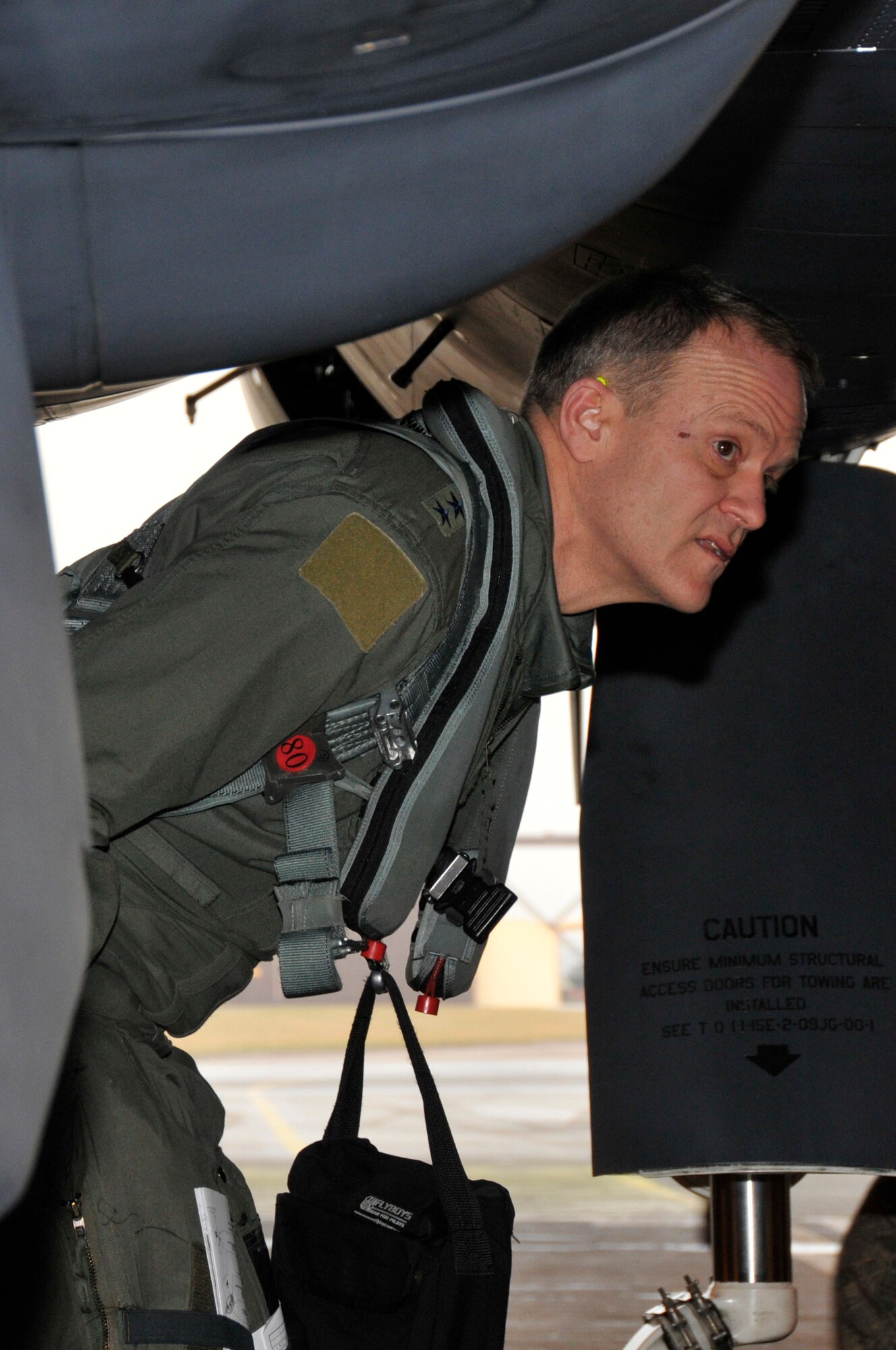 Maj. Gen. Mark T. Matthews, Director of Requirements, Headquarters Air Combat Command, a previous 48th Fighter Wing commander, inspects the F-15E Strike Eagle prior to his F-15E orientation flight with the 494th Fighter Squadron, Jan. 30 at RAF Lakenheath, England. (U.S. Air Force photo by Airman 1st Class Perry Aston)