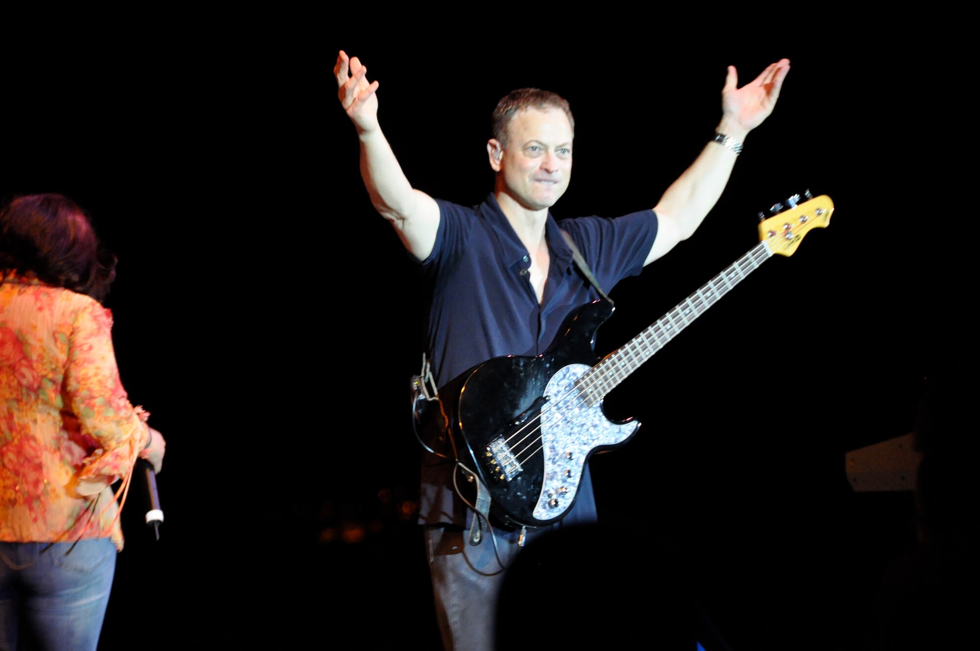 HICKAM AFB - CSI television show star and Blue Island, Ill. native Gary Sinise and his band, "Lt. Dan Ban" perform at Hickam Air Force Base, Hawaii on Jan. 31, 2009. Sinise and his "Lt. Dan Band" performed at Marine Corps Base Hawaii (MCBH) Kaneohe Bay on Jan 30, 2009 in addition to speaking to Hickam's Airmen and giving them a pep talk for their upcoming Operational Readiness Inspection (ORI). (U.S.  Air Force photo/Tech Sgt. Cohen A. Young) 