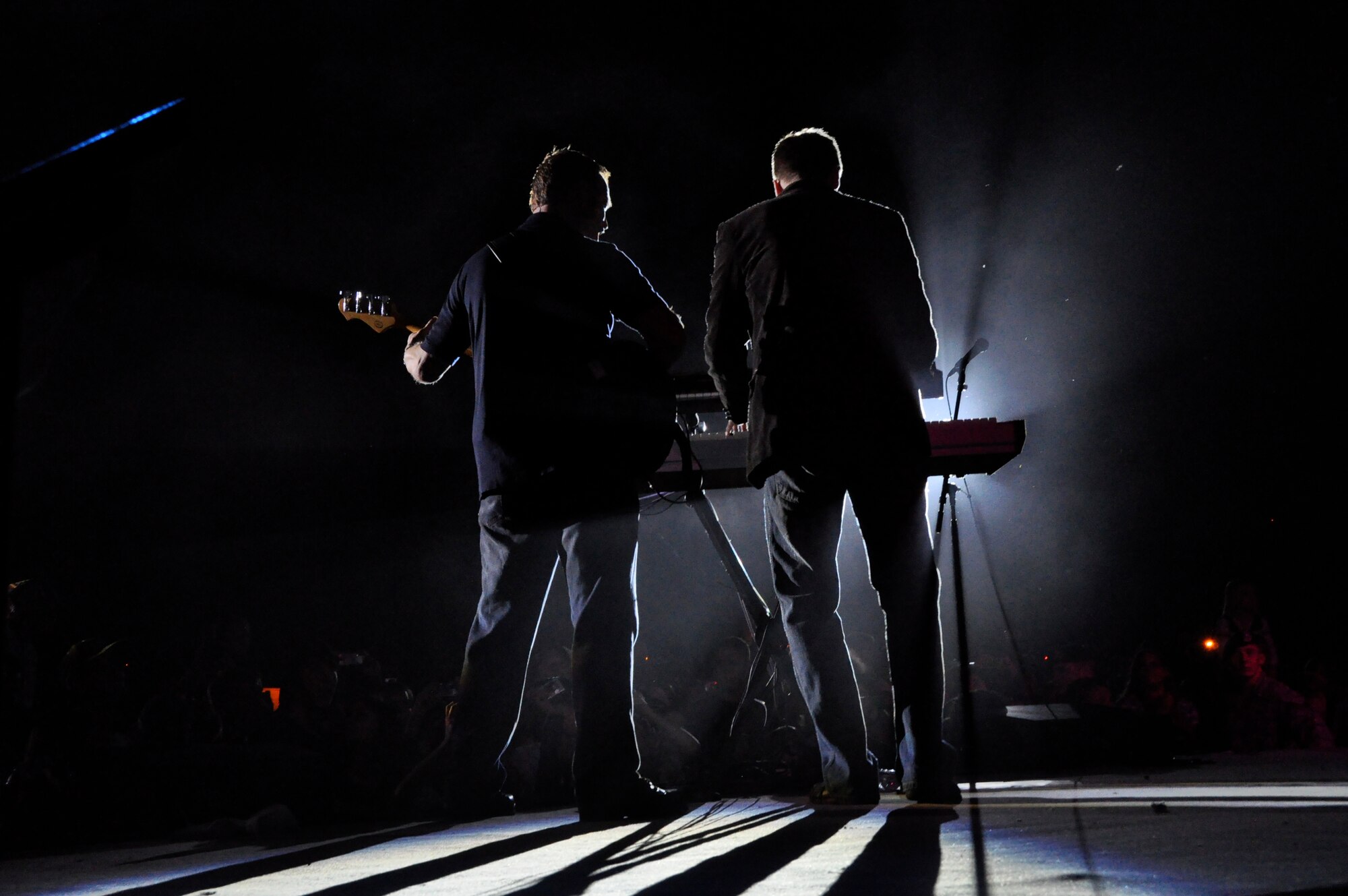 HICKAM AFB - CSI television show star and Blue Island, Ill. native Gary Sinise (left) and keyboard artist Ben Lewis, both of the "Lt. Dan Ban" perform at Hickam Air Force Base, Hawaii on Jan. 31, 2009. Sinise and his "Lt. Dan Band" performed at Marine Corps Base Hawaii (MCBH) Kaneohe Bay on Jan 30, 2009 in addition to speaking to Hickam's Airmen and giving them a pep talk for their upcoming Operational Readiness Inspection (ORI). (U.S.  Air Force photo/Tech Sgt. Cohen A. Young) 
