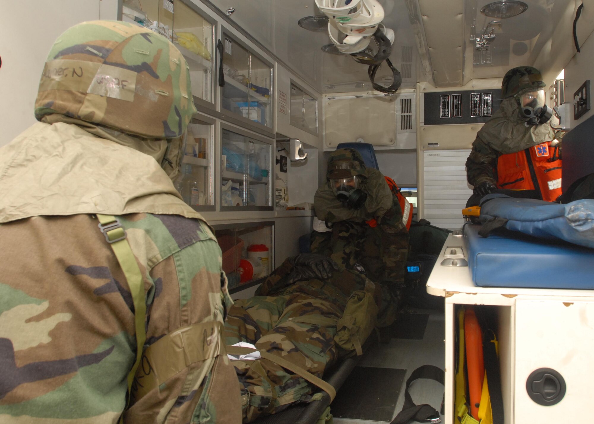 YOKOTA AIR BASE, Japan- Paramedics, from the 374th Medical Group, prepare to transport an AIrman to the hospital during Exercise Beverly Morning Feb. 5. The exercise was designed to prepare and train Airmen in case of an attack.(U.S. Air Force photo by Airman Sean Martin)