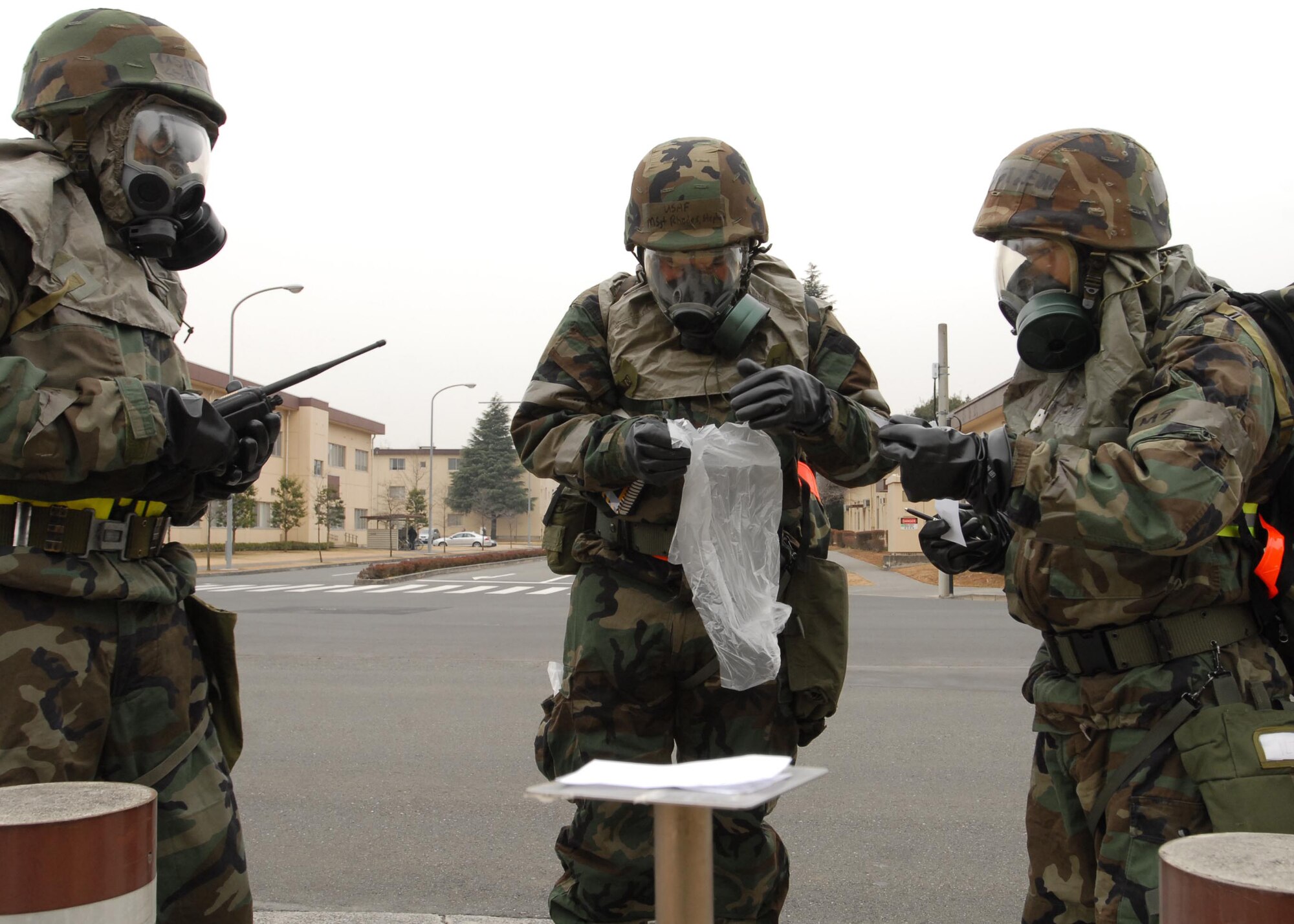 YOKOTA AIR BASE, Japan- Airmen on the Post Attack Recon team change out M-9 paper during Exercise Beverly Morning Feb. 5. The exercise was designed to prepare and train Airmen to respond if an attack were to happen. (U.S. Air Force photo by Airman Sean Martin)