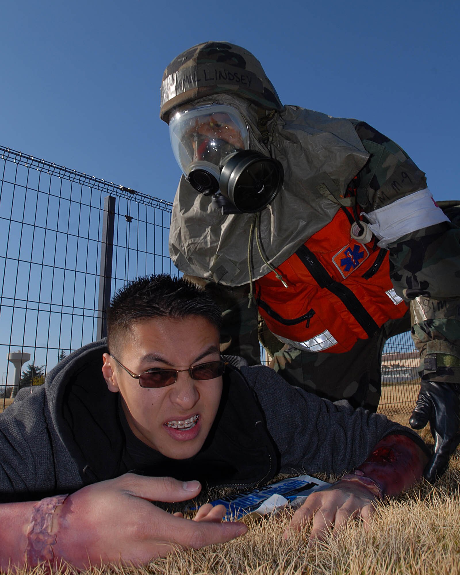 YOKOTA AIR BASE, Japan -- Technical Sgt. Jamel Lindsey, 374th Medical Group, treats injured personnel during exercise Beverly Morning, here Feb 6. Training exercises like this help sharpen airman's skills keeping them prepared for various situations. (U.S. Air Force photo/Airman 1st Class Michael Dillon)