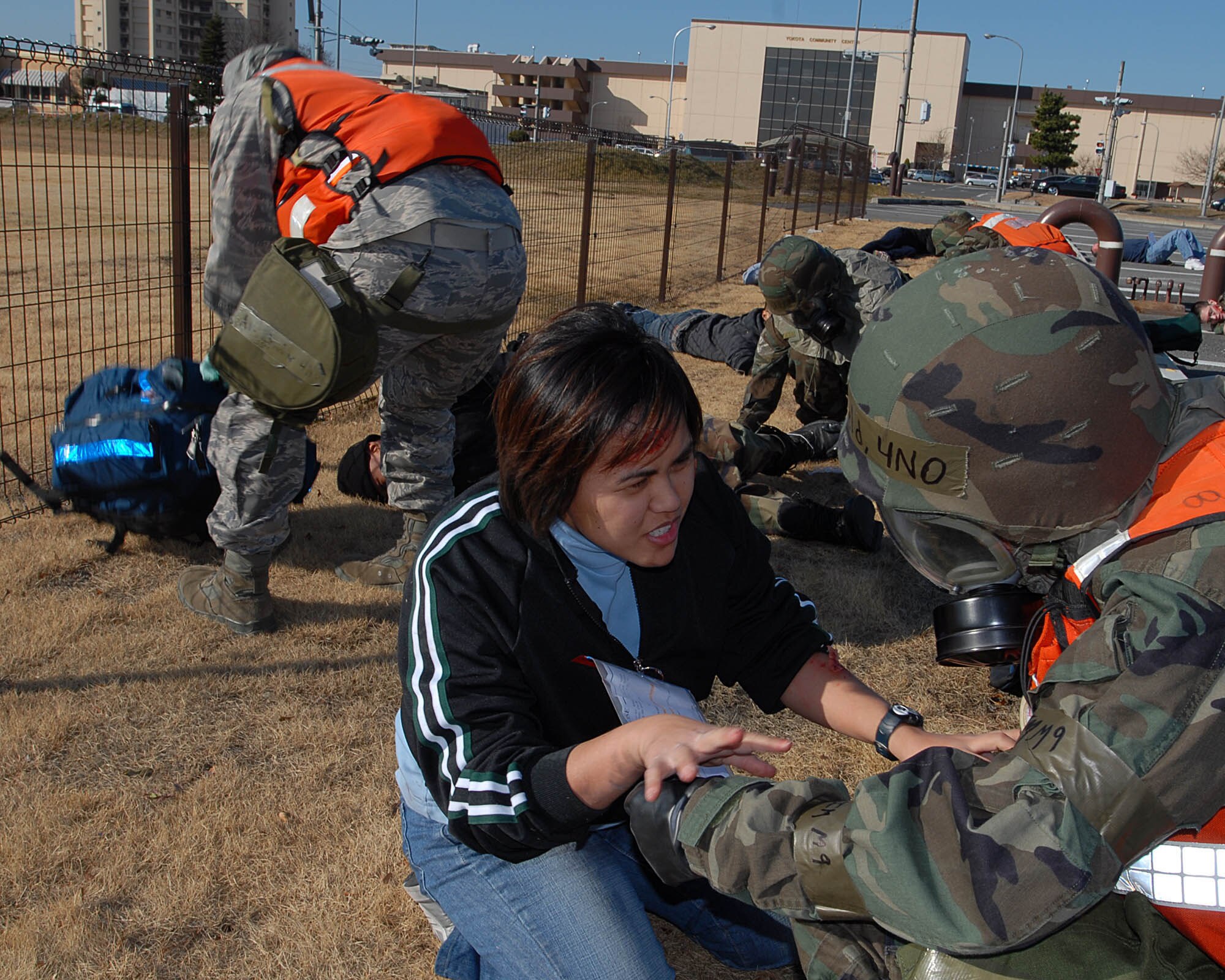 YOKOTA AIR BASE, Japan -- The Medical Group treats simulated injured personnel during exercise Beverly Morning, here Feb 6. Training exercises like this help sharpen Airman's skills keeping them prepared for various situations. (U.S. Air Force photo/Airman 1st Class Michael Dillon)