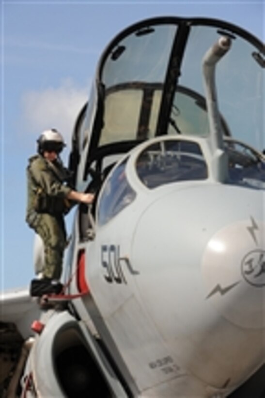 U.S. Navy Lt. j.g. Richard Rosenbush, an electronic counter measures operator, checks an EA-6B Prowler aircraft at Andersen Air Force Base, Guam, on Feb. 3, 2009.  The aircraft, assigned to Electronic Attack Squadron 136, is based at Naval Air Station Atsugi, Japan, and is taking part in Cope North, a regularly scheduled exercise designed to enhance U.S. and Japanese air operations in defense of Japan.  