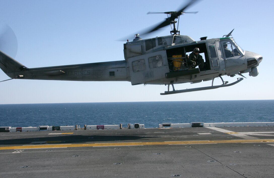 A UN-1N Huey helicopter from Marine Medium Tiltrotor Squadron 263 (Reinforced), 22nd Marine Expeditionary Unit, ::r::::n::comes in for a landing aboard USS Bataan during Composite Training Unit Exercise Feb. 6, 2009. COMPTUEX is part of ::r::::n::the MEU's pre-deployment training program. The 22nd MEU is scheduled to deploy this spring.::r::::n::(Official Marine Corps photo by Cpl. Theodore W. Ritchie)
