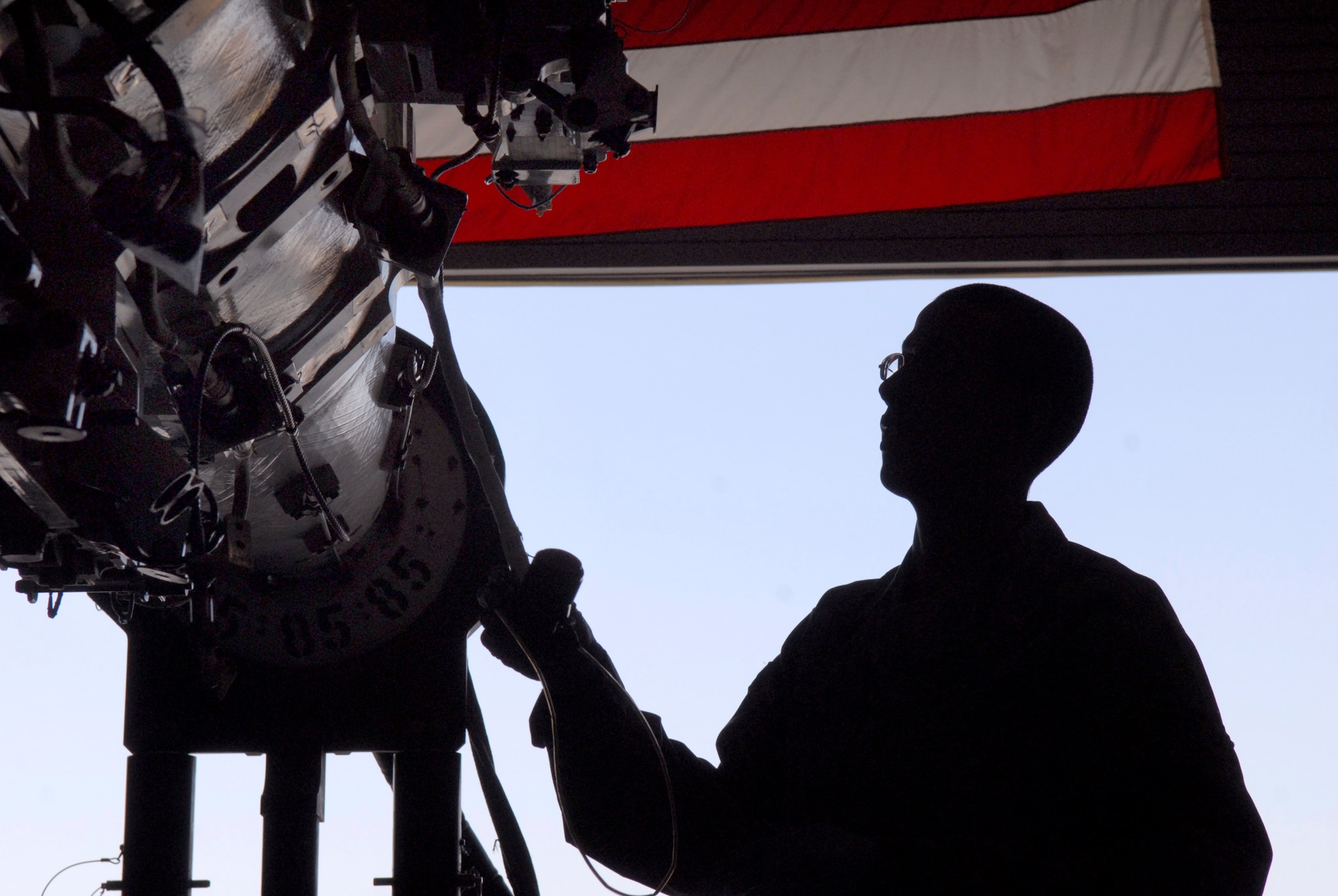 Senior Airman Diego Contreras, a 379th Expeditionary Maintenance Squadron Armament Team Member, fastens a 1760 cable onto a Multi-Purpose Rotary Launcher (MPRL) from a B-1B Lancer during service checks, Feb. 6, 2009, at an undisclosed location in Southwest Asia.  The 1760 cable permits communication between the aircrew and a GBU-31 bomb.  Senior Airman Contreras hails from Lexington, Ky. and is deployed from Dyess Air Force Base, Texas in support of Operation Iraqi and Enduring Freedom and Combined Joint Task Force- Horn of Africa.  (U.S. Air Force Photo by Airman 1st Class Andrew Satran/Released)