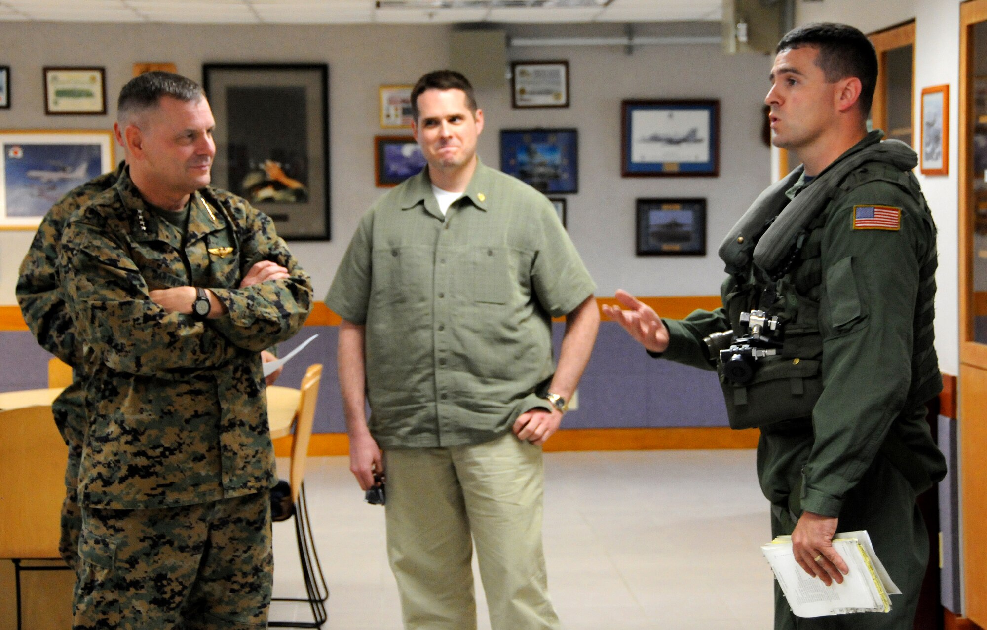 ANDERSEN AIR FORCE BASE, Guam - U.S. Navy Aviation Warfare Systems Operator 1st Class Joshua Beltramo gives Vice Chairman of the Joint Chiefs of Staff U.S. Marine Gen. James E. Cartwright and other members a safety briefing at Andersen?s base operations before an MH-60 Knighthawk helicopter tour around the island Feb. 7.  General Cartwright visited Andersen to receive an operational update on the military forces based on Guam and the status of plans for moving Marines from Okinawa, Japan, to Guam. (U.S. Air Force photo by Airman 1st Class Courtney Witt)(released)