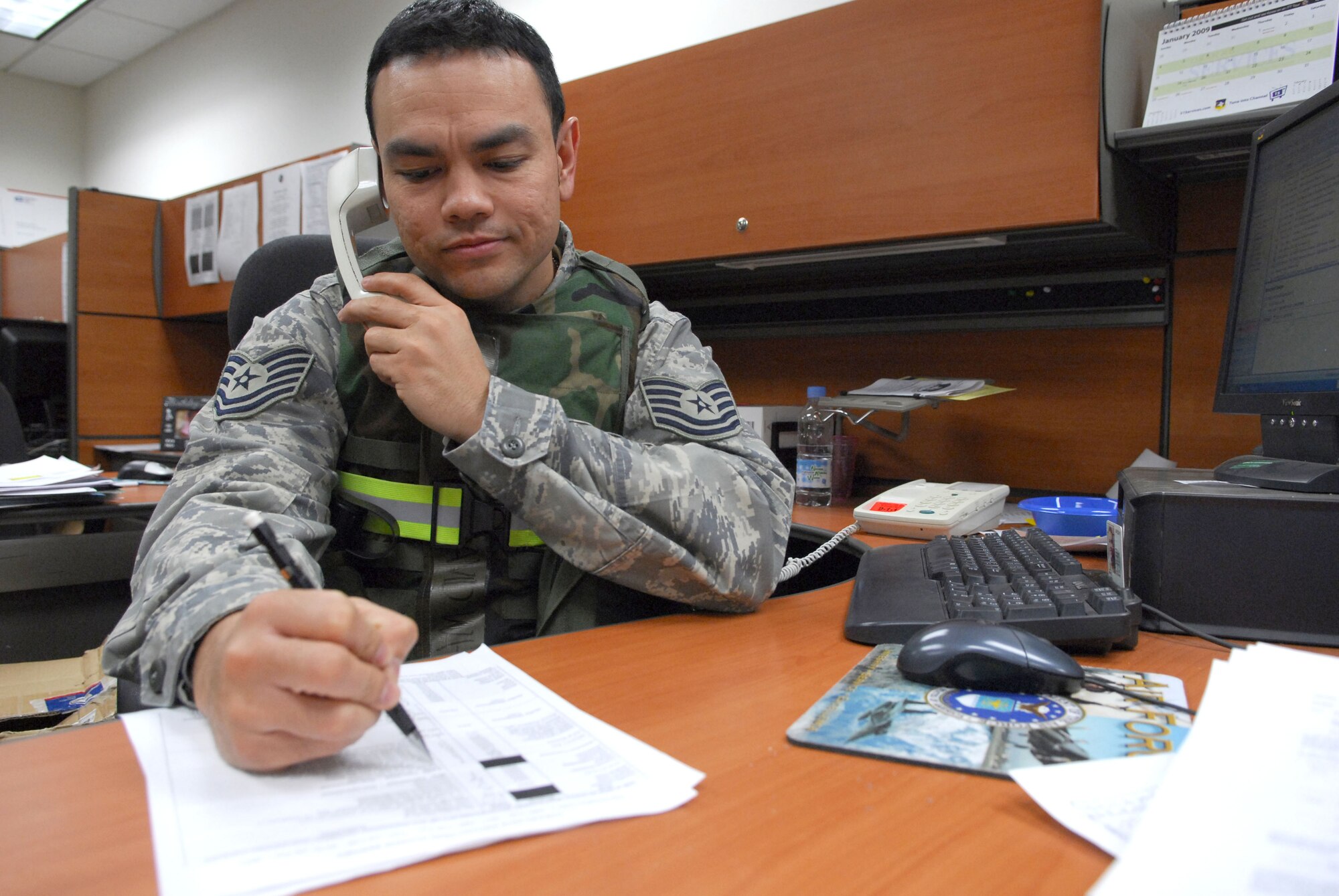 Tech Sgt. David White records information to complete a shelter report at the Mission Support Squadron unit control center during the 51st Fighter Wing’s Operational Readiness Exercise Beverly Midnight 09-01 at Osan AB, Republic of Korea, Feb. 8. The exercise tests Team Osan's ability to survive and operate during a nuclear, biological, or chemical attack.  (U.S. Air Force Photo/Senior Airman Christopher Boitz)
 
