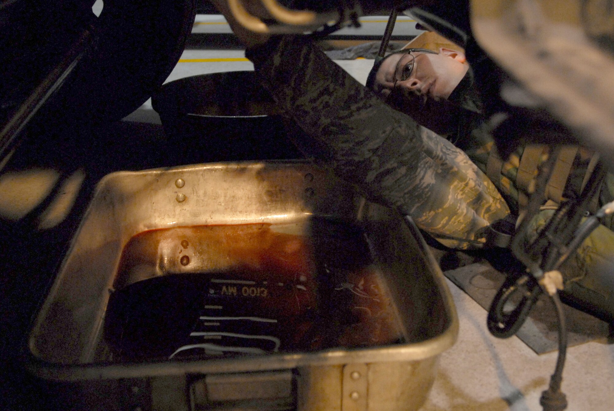 Staff Sgt. John Von Elling disassembles the cooling system of an ambulance during the 51st Fighter Wing’s Operational Readiness Exercise Beverly Midnight 09-01 at Osan AB, Republic of Korea, Feb. 8. The cooling system had to be removed to fix a bent push rod that was stuck in the engine head. Sergeant Von Elling is a vehicle maintainer with the 51st Logistic Readiness Squadron.  (U.S. Air Force Photo/Senior Airman Christopher Boitz) 
