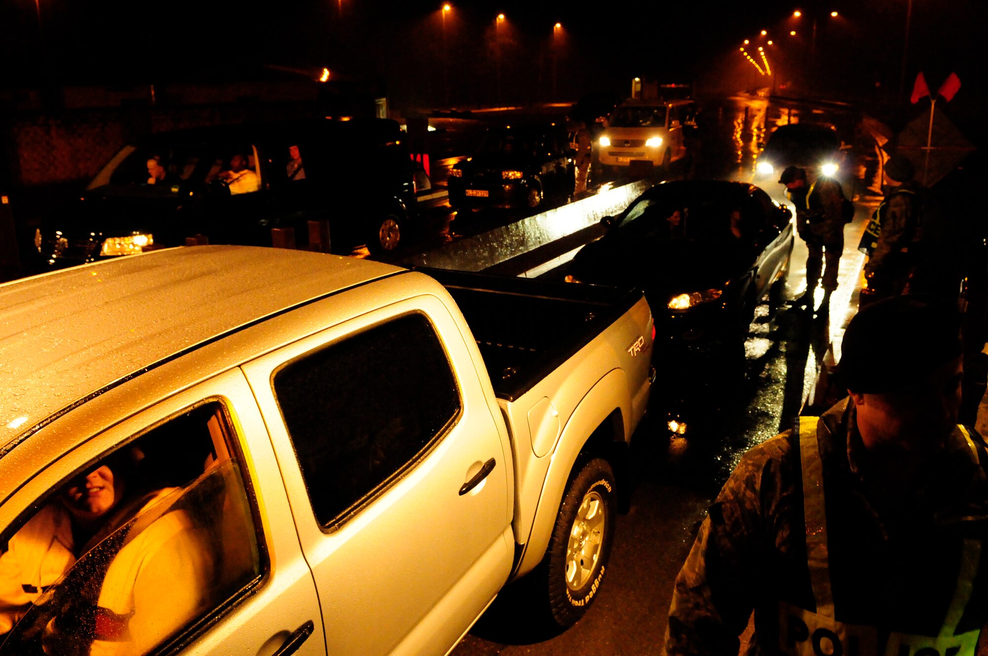 Visitors and residents pass through a sobriety checkpoint Feb. 7, 2009, at Ramstein Air Base. Sobriety checkpoints are held randomly throughout the Kaiserslautern Military Community in an effort to enforce a zero-tolerance policy against driving under the influence of drugs and alcohol. (U.S. Air Force photo by Staff Sgt. Stephen J. Otero) 