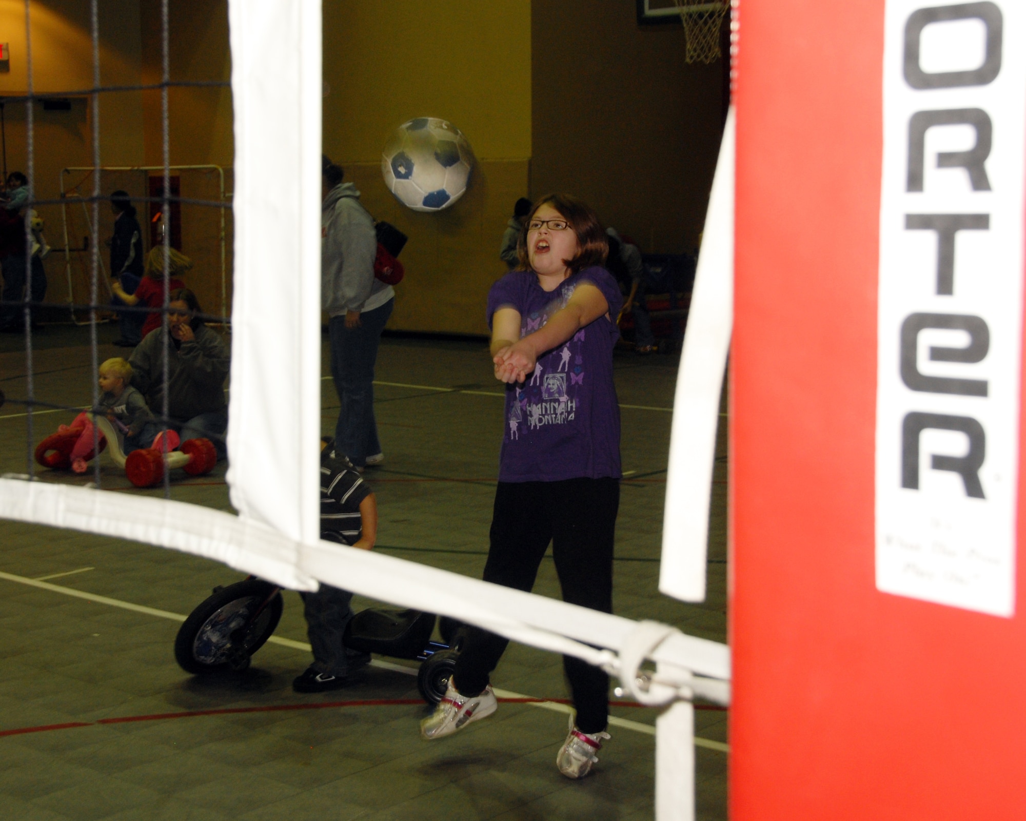 Rylee Spidell, the daughter of Staff Sgt. Tony and Lisa Spidell, 185th Air Refueling Wing, works on her volleyball skills during an outing sponsored by the Bats Family Club.  The Bats family Club is part of the Family Readiness Group made up of volunteers who pursue the well-being of the 185th families, providing support and camaraderie within the family structure.
Official Air Force photo by; Master Sgt. Bill Wiseman (Released)
