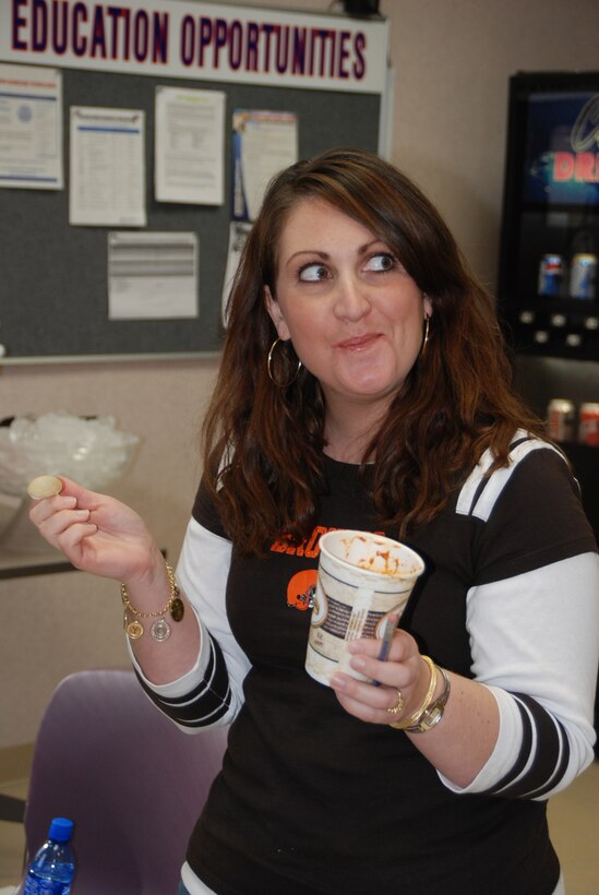 The 932nd Airlift Wing (AW) at Scott AFB, Ill. held a civilian commanders call in conjunction with the wing?s annual chili cookoff. Air Reserve Technician (ART) Tech. Sgt. Melissa Baker (right), 932nd Aerospace Medicine Flight (AMDF), was one of three judges who had the tasty opportunity to evaluate 15 entries. The other judges were Tech. Sgt. Brent Harting, 932nd AMDF, and Mr. David Skinner, with the 375th AW Education and Training Office. 