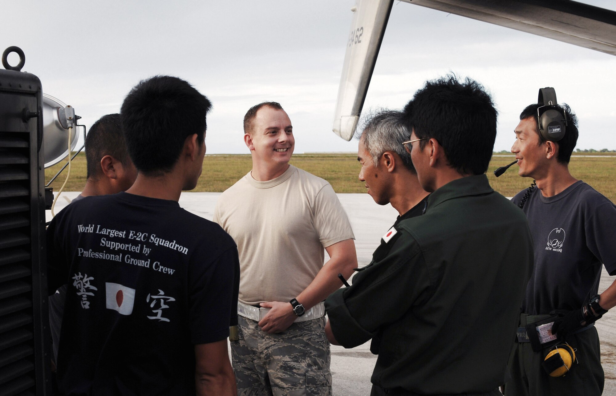 Tech. Sgt. Anthony Bowman coordinates fuel off loads Feb. 5 with Japanese Air Self Defense Force aircraft maintainers at Andersen Air Force Base, Guam, during Cope North 09-1.  JASDF aircraft are joining forward-deployed U.S. Air Force and Navy aircraft to participate in this year's Cope North exercise Feb. 2 through 13, with a focus on interoperability.   Sergeant Bowman is a fuels specialist with the 36th Logistics Readiness Squadron at Andersen AFB.  (U.S. Air Force photo/Master Sgt. Kevin J. Gruenwald)