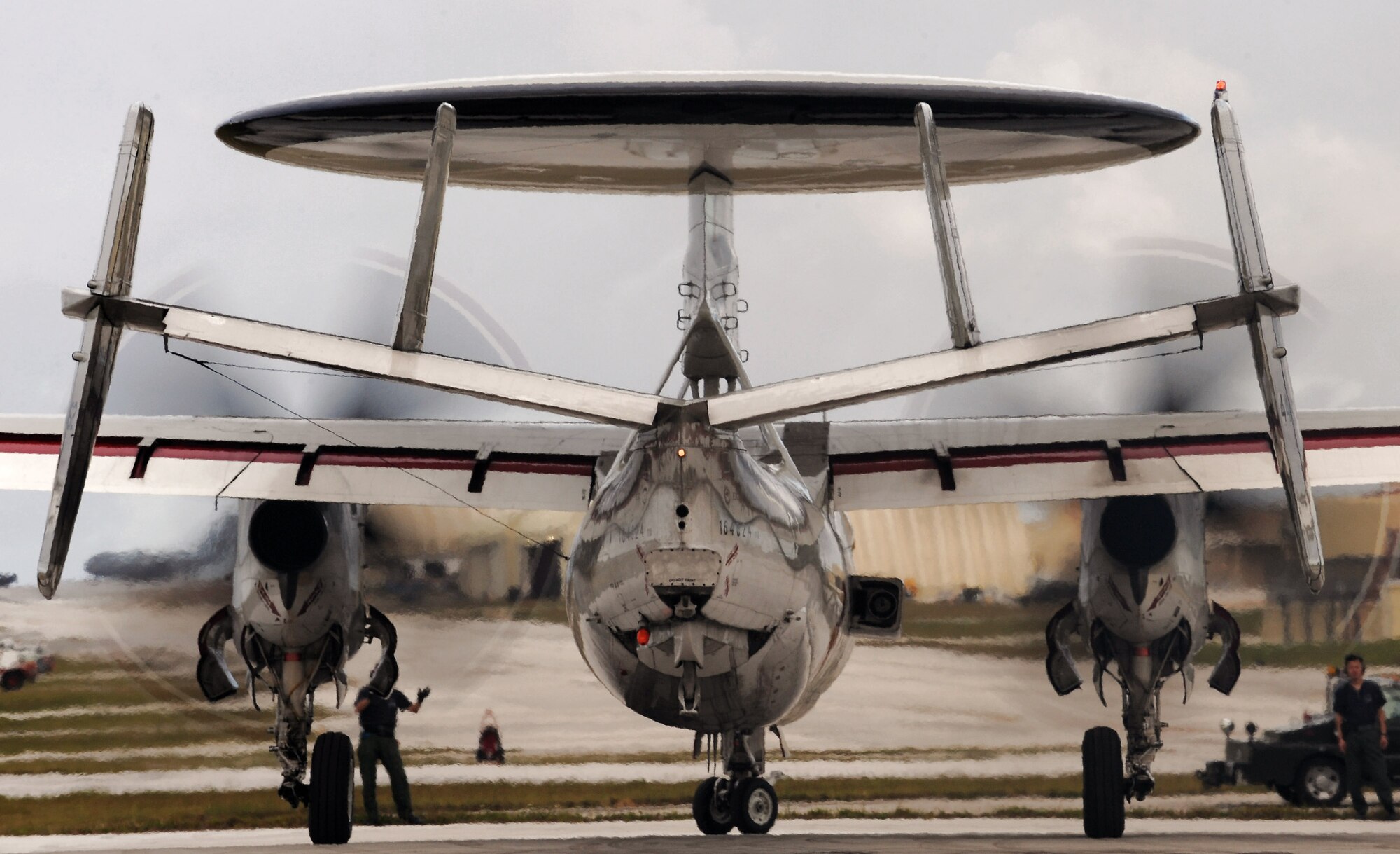 Japanese E-2C Hawkeye maintainers from the 601st Squadron at Misawa Air Base, Japan, guide an E-2C Hawkeye into a parking spot Feb. 5 at Andersen Air Force Base, Guam, during Cope North 09-1 after a local-area mission. Japan Air Self Defense Force aircraft are joining forward-deployed U.S. Air Force and Navy aircraft to participate in this year's Cope North exercise Feb. 2 through 13, with a focus on interoperability.  (U.S. Air Force photo/Master Sgt. Kevin J. Gruenwald) 