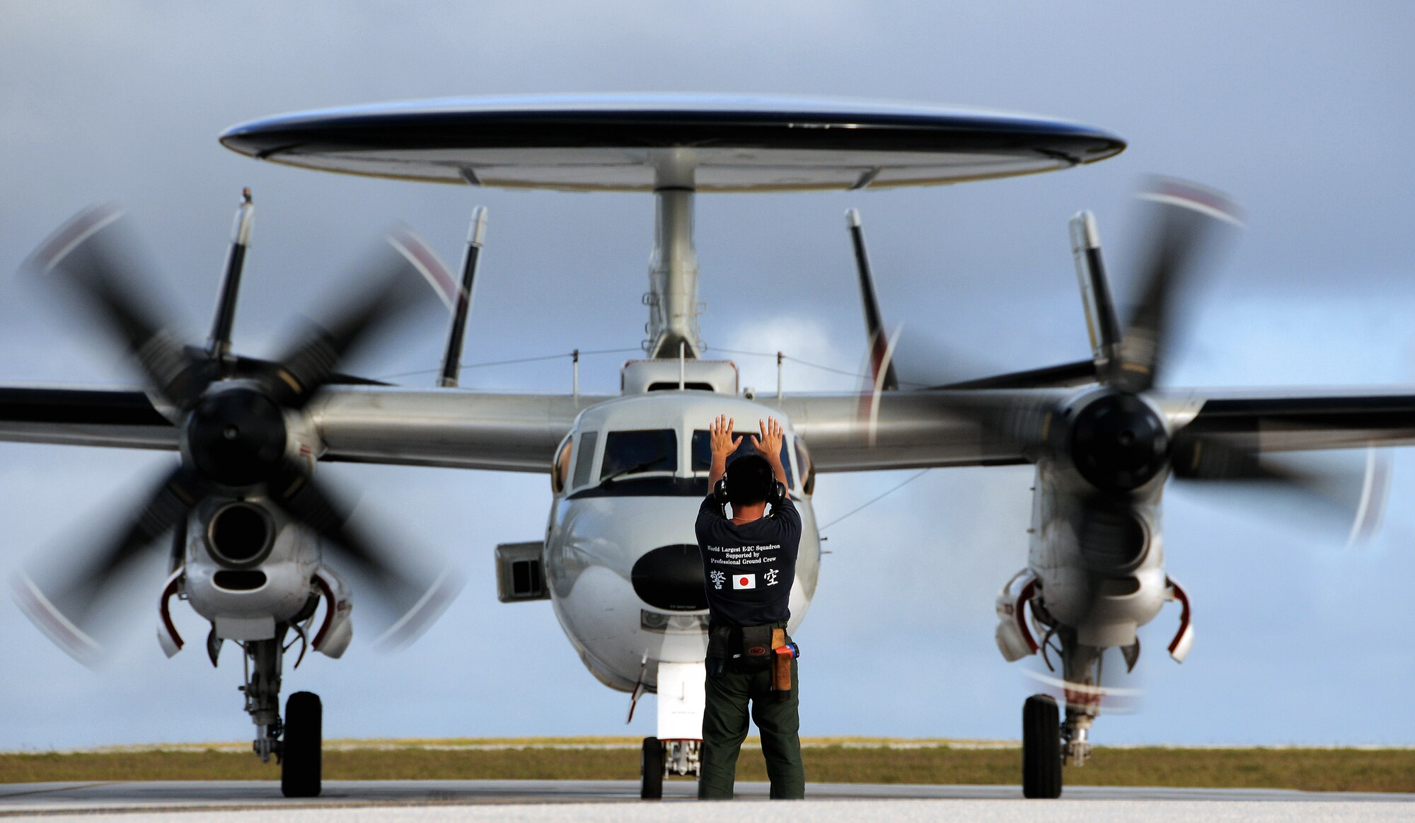 The crew of a Japan Air Self Defense Force E-2C Hawkeye at Andersen Air Force Base, Guam, for a Cope North exercise, starts its engines Feb. 4 for a familiarization flight. This is the 10th time that Cope North has been held on Andersen AFB, and the fourth time that the JASDF will use live ordnance since the first exercise, in 1978. (U.S. Air Force photo/Airman 1st Class Courtney Witt)
