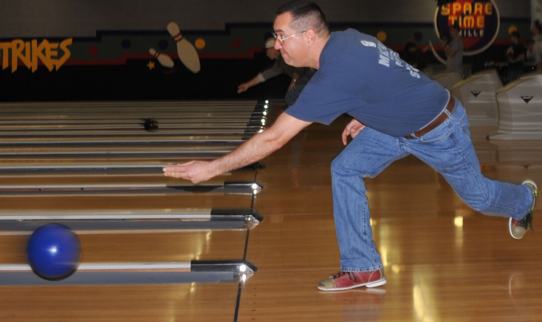 Master Sgt. Joseph Salomon (932nd Maintenance Squadron) was a standout bowler for his team at the Rising Six annual tournament.   Some 22 teams competed for trophies and door prizes. The Rising Six enlisted organization raises funds from raffle ticket sales to help fund Wing recreation events and other projects.  U.S. Air Force photo/Tech. Sgt. Dan Oliver