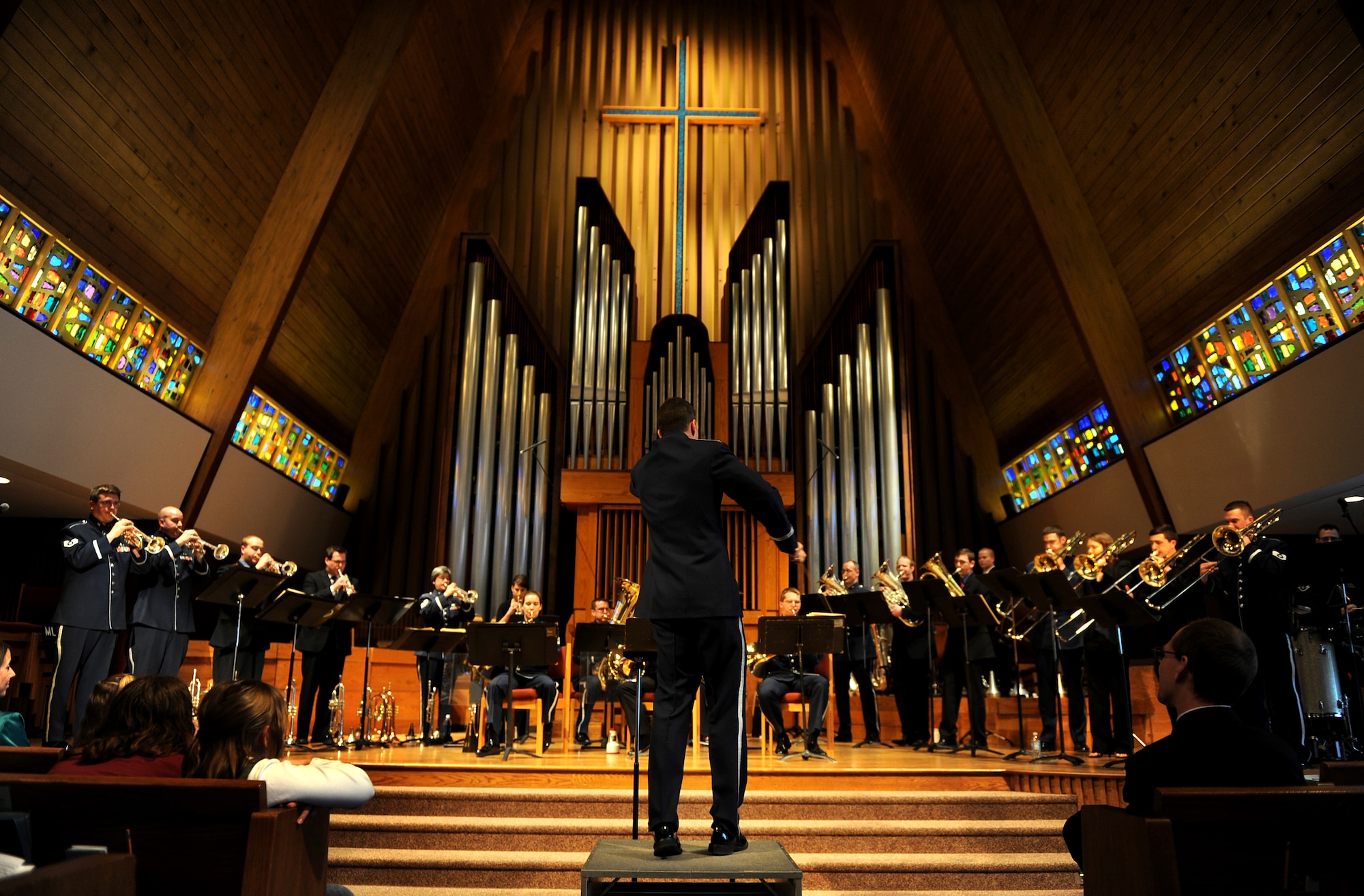 OFFUTT AFB, Neb. -- Capt Michael J. Willen, commander, Heartland of America Band conducts the final song in a concert held at the Presbyterian Church of the Cross, Omaha,Feb. 8. The concert which also featured eight members from the University of Omaha Band was one of a concert series hosted by the church to celebrate their 20th season of concerts.

U.S. Air Force Photo by Josh Plueger