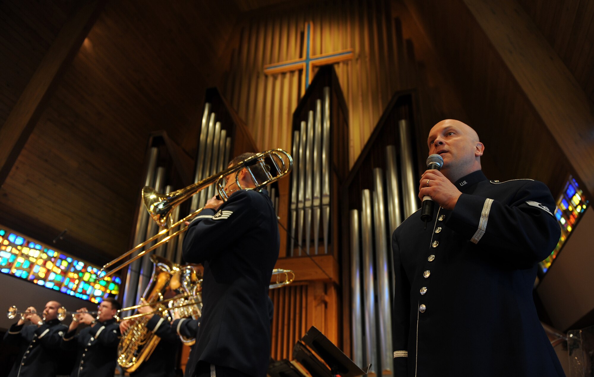 OFFUTT AFB, Neb. -- Tech. Sgt. Ken Maxwell, Heartland of America Band, sings the national anthem as part of the Organ Vesper Series concert featuring the Brass in Blue ensemble, Presbyterian Church of the Cross, Feb 8.  This public concert was one of a concert series hosted by the church to celebrate their 20th season of concerts.

U.S. Air Force Photo by Josh Plueger