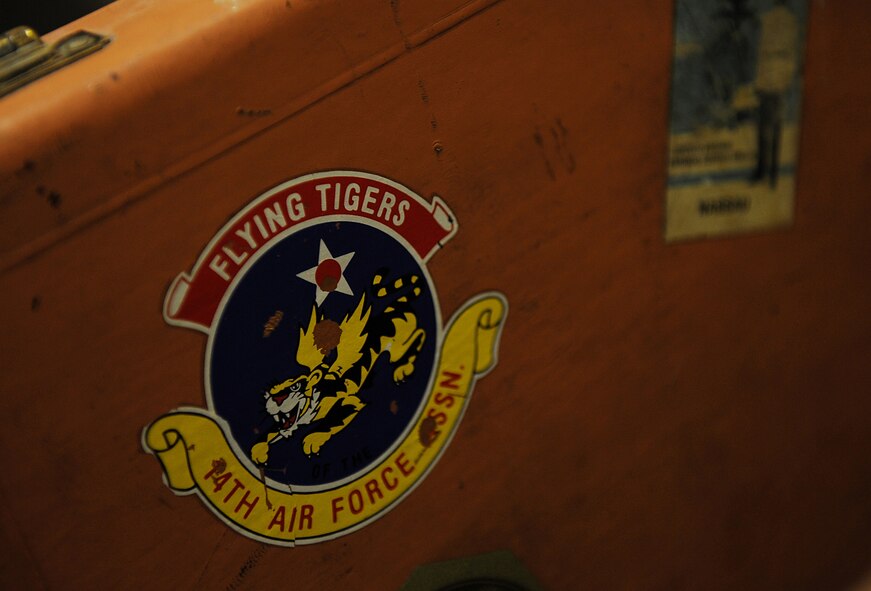 MOODY AIR FORCE BASE, Ga. -- A sticker with the original design of the Flying Tigers is affixed to the briefcase of Jack Hild, former president and historian for the 14th Air Force Association of Flying Tigers, who visited Moody Jan. 30. Mr. Hild served with the Flying Tigers during World War II. During his visit, he received a tour of the Parker Green Base Support Center, the 23rd Fighter Group as well as an opportunity to ride in the A-10C Thunderbolt II flight simulator. (U.S. Air Force photo by Senior Airman Gina Chiaverotti)