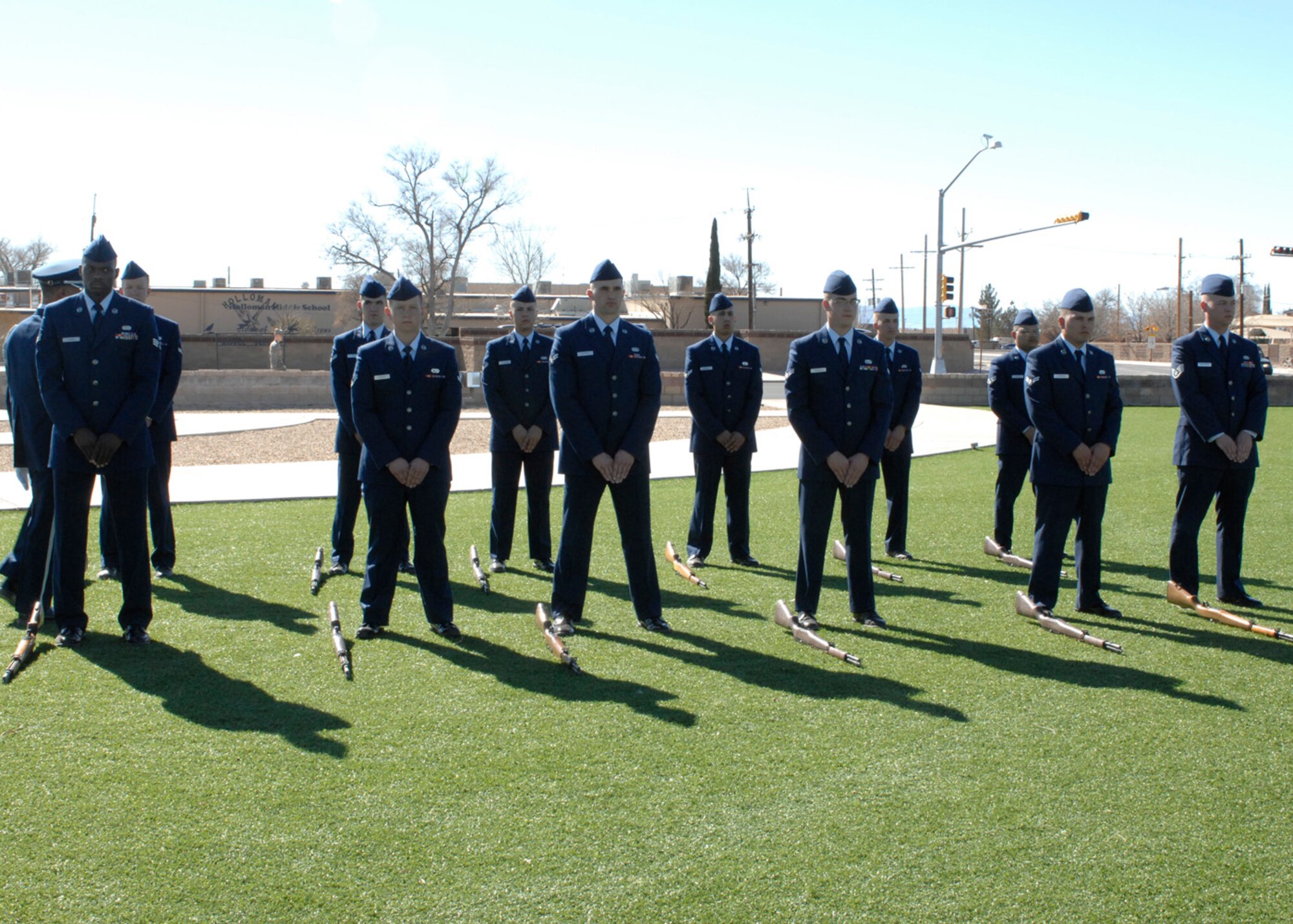 The newest members of the Steel Talons Honor Guard prepare to show off their skills during their graduation ceremony, Feb. 3, at Heritage Park at Holloman Air Force Base, N.M. Steel Talon, guardsmen must go through a six-day training course where they learn the basics in unarmed drill, armed drill, flag folding and the firing sequence. (U.S. Air Force photo/Airman 1st Class Rachel A. Kocin)