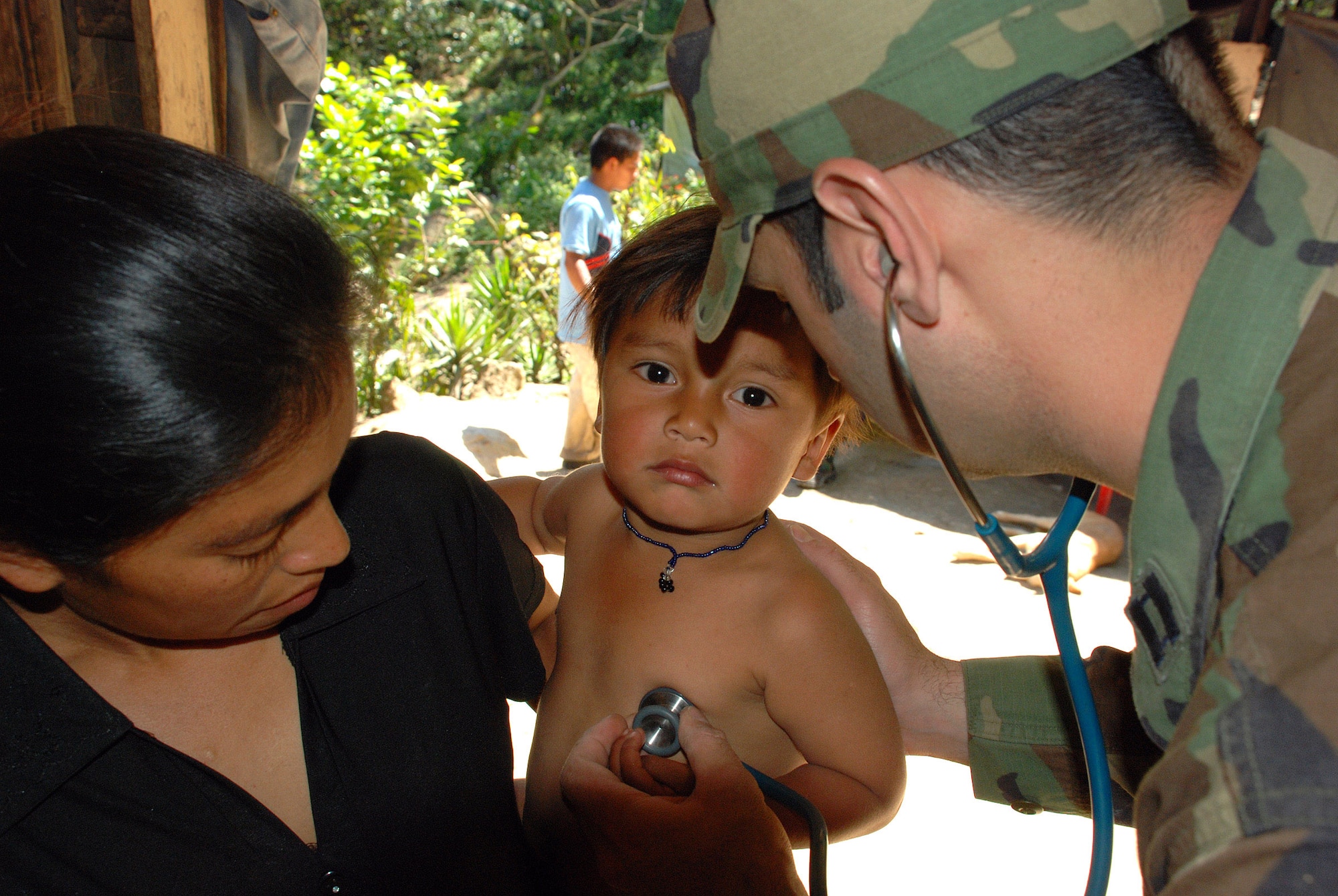 An Air Force physician's assistant conducts a physical examination of an 18-month old boy in the remote village of Marcala, Honduras. A team of 16 medical workers and dieticians traveled there from the United States to take part in a pediatric nutrition medical readiness training exercise, screening children and mothers for anemia and educating them on nutrition. The team partnered with specialists from the Honduran Ministry of Health and the medical element of Joint Task Force-Bravo, based at Soto Cano Air Base, Honduras. (U.S. Air Force photo/Tech. Sgt. Mike Hammond)  