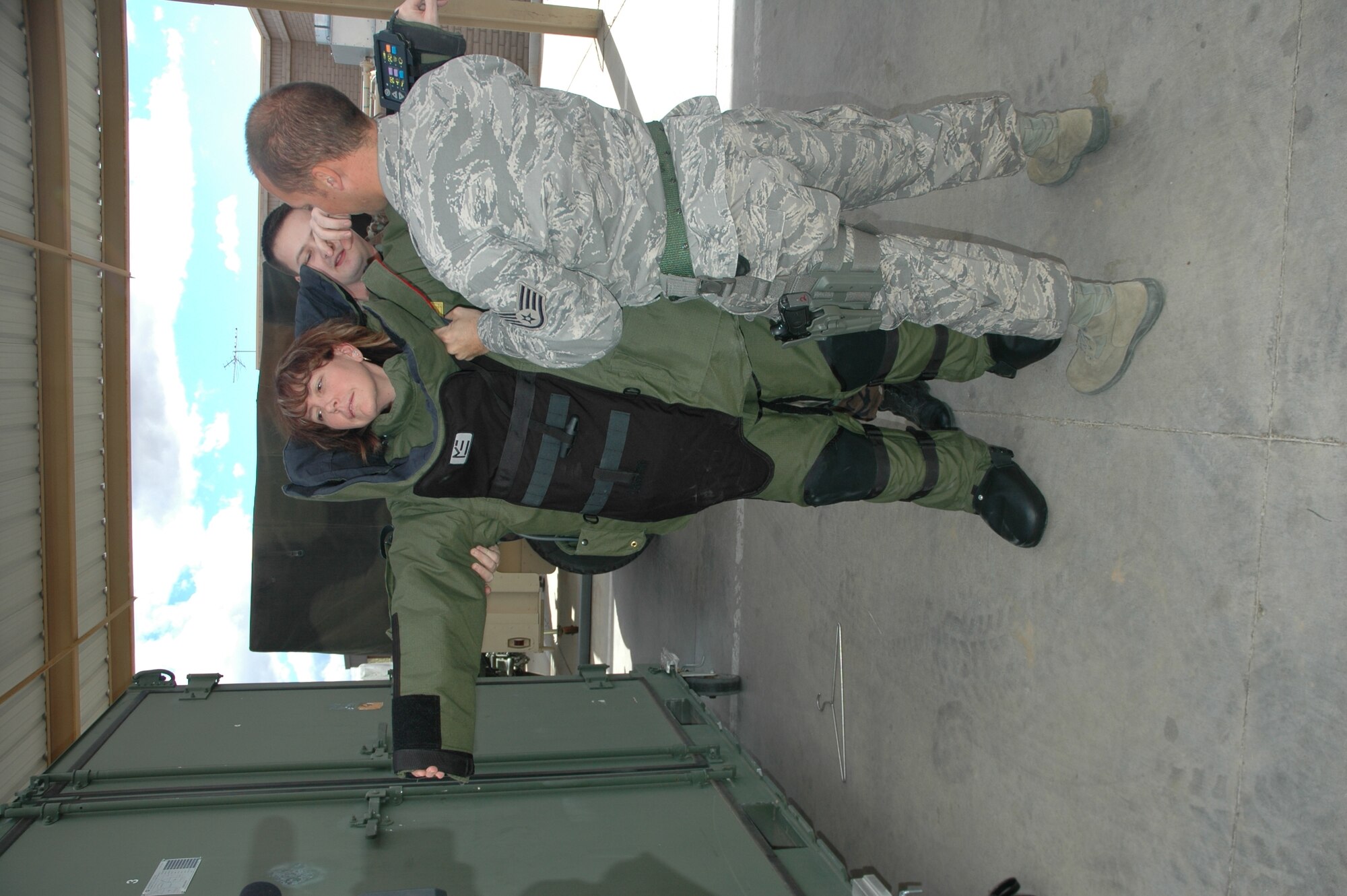 Jennifer Brewer, employee with Verde Valley Medical Center/Northern Arizona Healthcare, is dressed in a 'bomb suit' during the 944th Civil Engineer Explosive Ordnance Disposal Flight's demonstration. The EOD specialists demonstrated their training and capabilities to civilian employers of reservists during the 944th Fighter Wing's annual Bosses Day Feb. 7. (U.S. Air Force photo/Tech. Sgt. Susan Stout) 