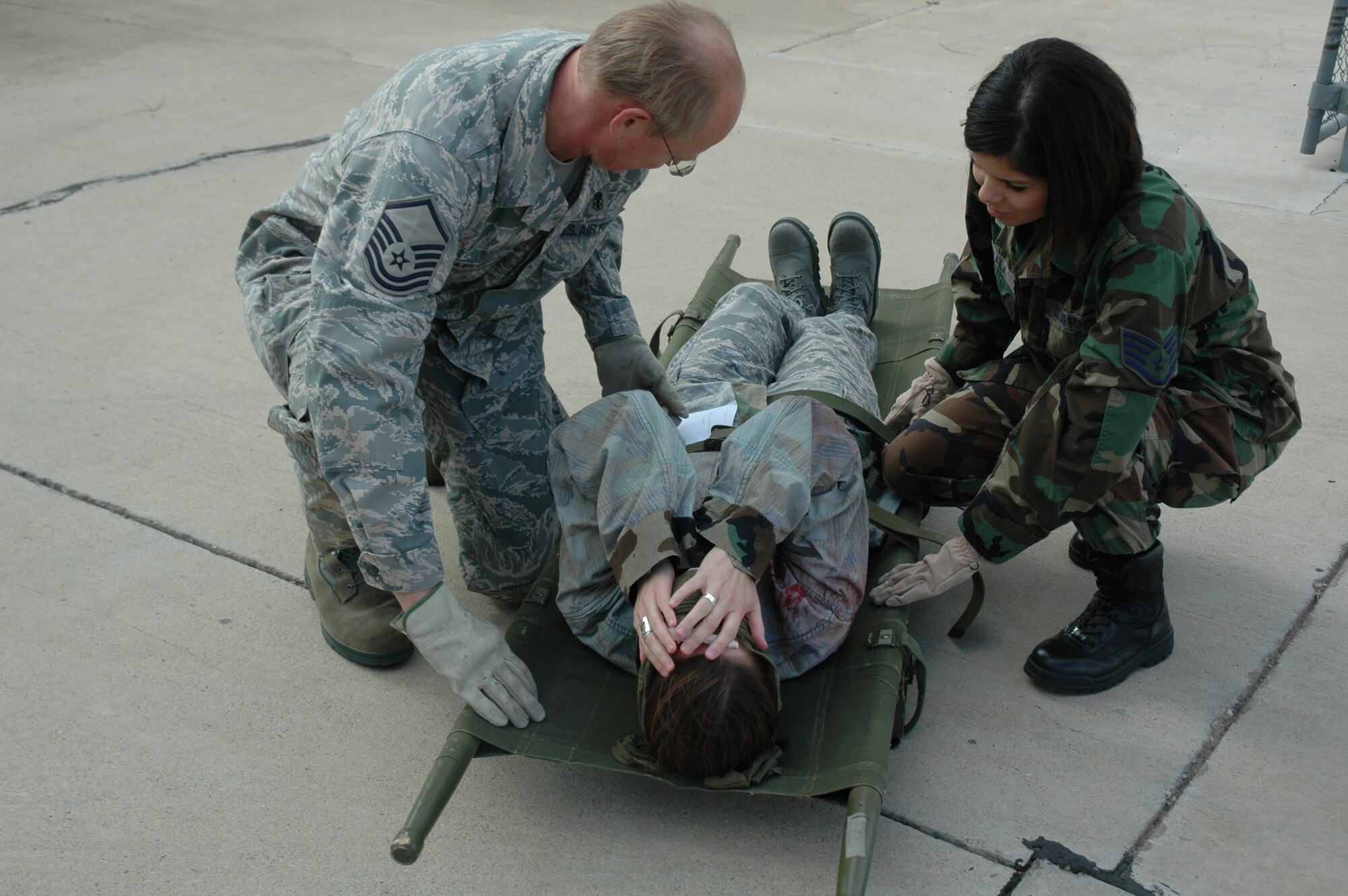 As part of the 944th Fighter Wing's annual Bosses Day Feb. 7, civilian employers of unit reservists witnessed the 944th Aeromedical Staging Squadron and the 944th Medical Squadron in a mass casualty exercise. To make the exercise seem more realistic, 'patients' are given wounds with makeup. Throughout the year, reservists exercise to enhance their training and prepare themselves for unexpected events. (U.S. Air Force photo/Tech. Sgt. Susan Stout) 