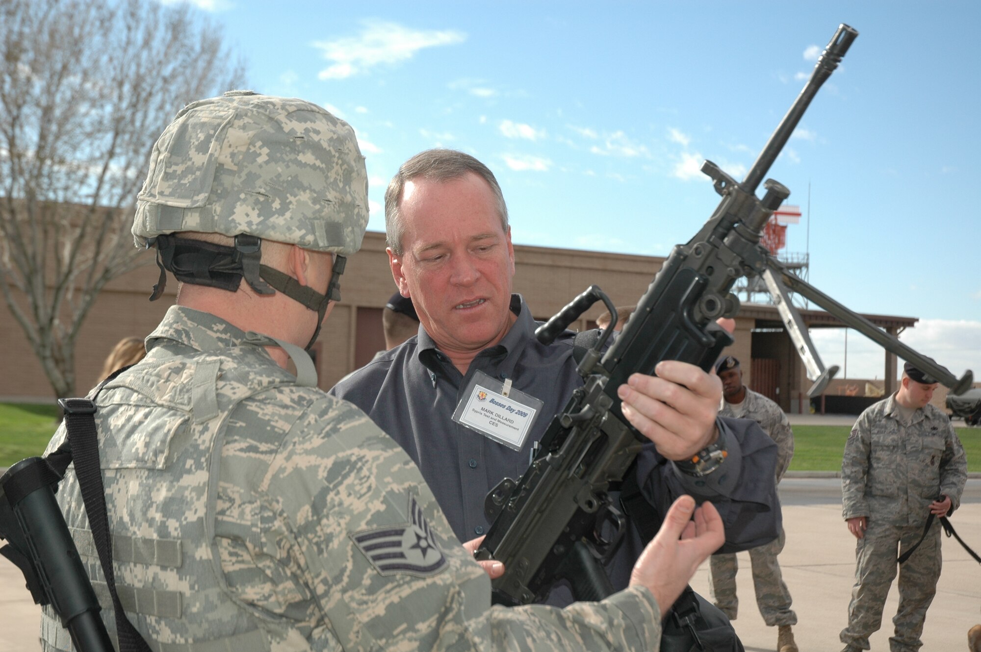 Mark Dillard, employee with Sypris Test and Measurement, learns about the weapons systems and equipment used by security forces personnel during the 944th Fighter Wing's annual Bosses Day Feb. 7. (U.S. Air Force photo/Tech. Sgt. Susan Stout) 