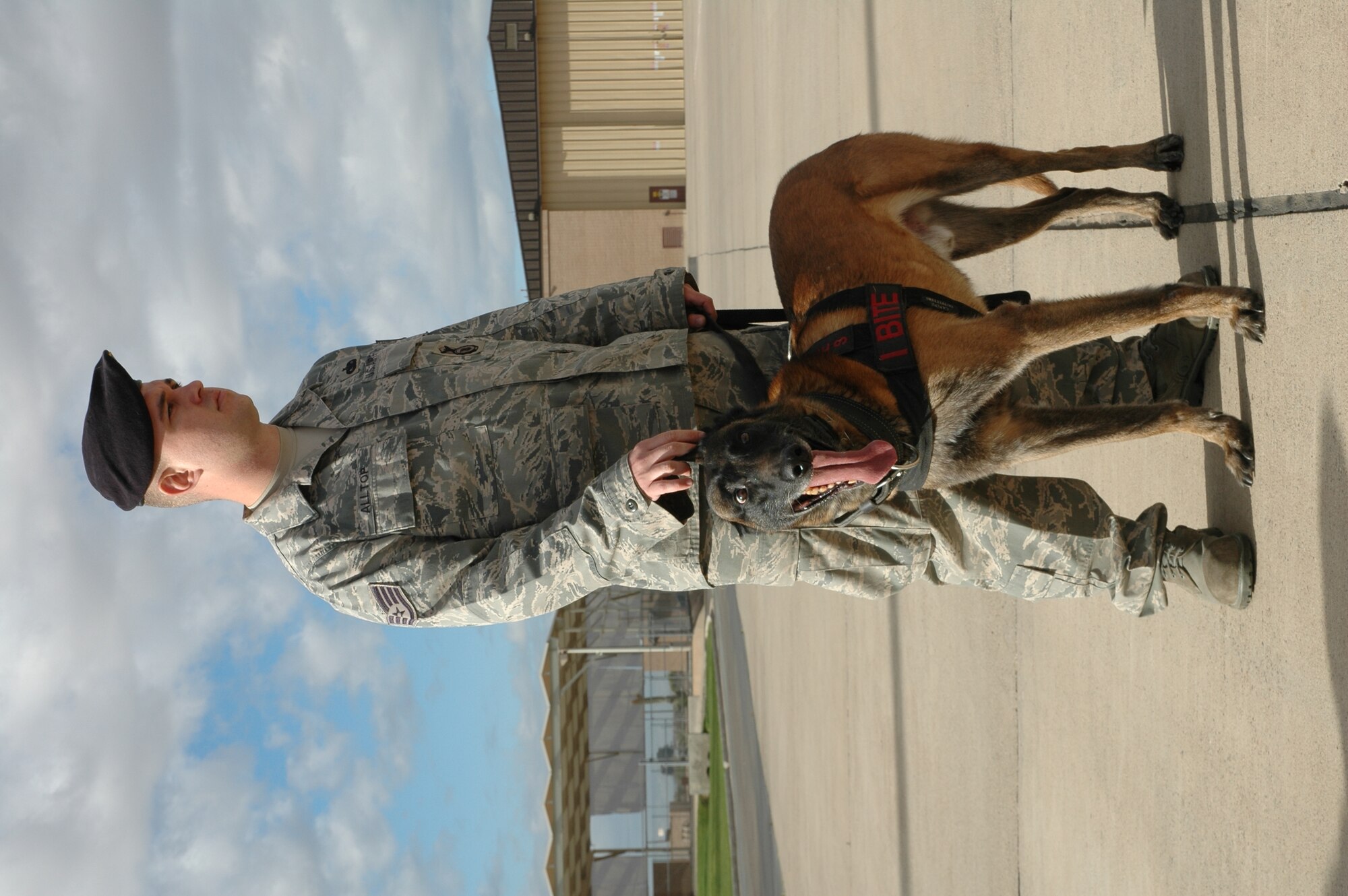 Staff Sgt. Kyle Alltop, 56th Security Forces Squadron K9 handler, participates in a demonstration during the 944th Fighter Wing's Bosses Day event Feb. 7. Bosses Day is an annual event where civilian employers of Reservists are invited to learn about the mission of the Air Force both at home and while deployed. The 944th SFS welcomed home 37 of their members in January from a six-month deployment to Kirkuk Regional Air Base, Iraq. While there, four of the Reservists were certified as dog handlers. (U.S. Air Force photo/Tech. Sgt. Susan Stout) 