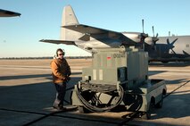EGLIN AFB, Fla. -- Michael Zukosky, a crew chief from the 919th Aircraft Maintenance Squadron at Duke Field, Fla., readies a power cart for an MC-130E Combat Talon I here Feb. 5.  He is one of more than 200 maintainers and aircrew members from the Reserve 919th Special Operations Wing at Duke Field who temporarily moved their aircraft 15 miles south to Eglin while their home station?s runway and parking ramp areas are completely resurfaced.  The project is expected to take four months to complete. (USAF photo by  Dan Neely)
