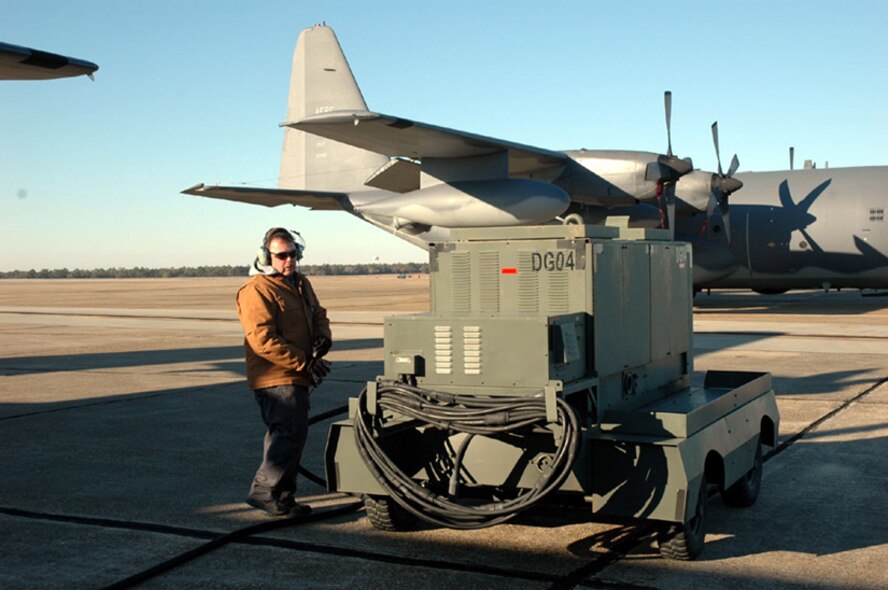EGLIN AFB, Fla. -- Michael Zukosky, a crew chief from the 919th Aircraft Maintenance Squadron at Duke Field, Fla., readies a power cart for an MC-130E Combat Talon I here Feb. 5.  He is one of more than 200 maintainers and aircrew members from the Reserve 919th Special Operations Wing at Duke Field who temporarily moved their aircraft 15 miles south to Eglin while their home station?s runway and parking ramp areas are completely resurfaced.  The project is expected to take four months to complete. (USAF photo by  Dan Neely)